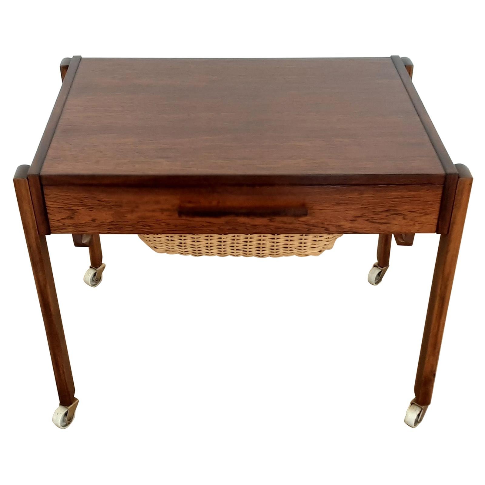 Midcentury Rosewood Table with Sectioned Drawer and Storage Basket For Sale