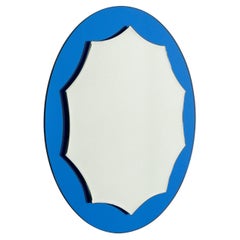 Specchio da parete rotondo blu del Medioevo in stile Cristal Arte, Italia 1960