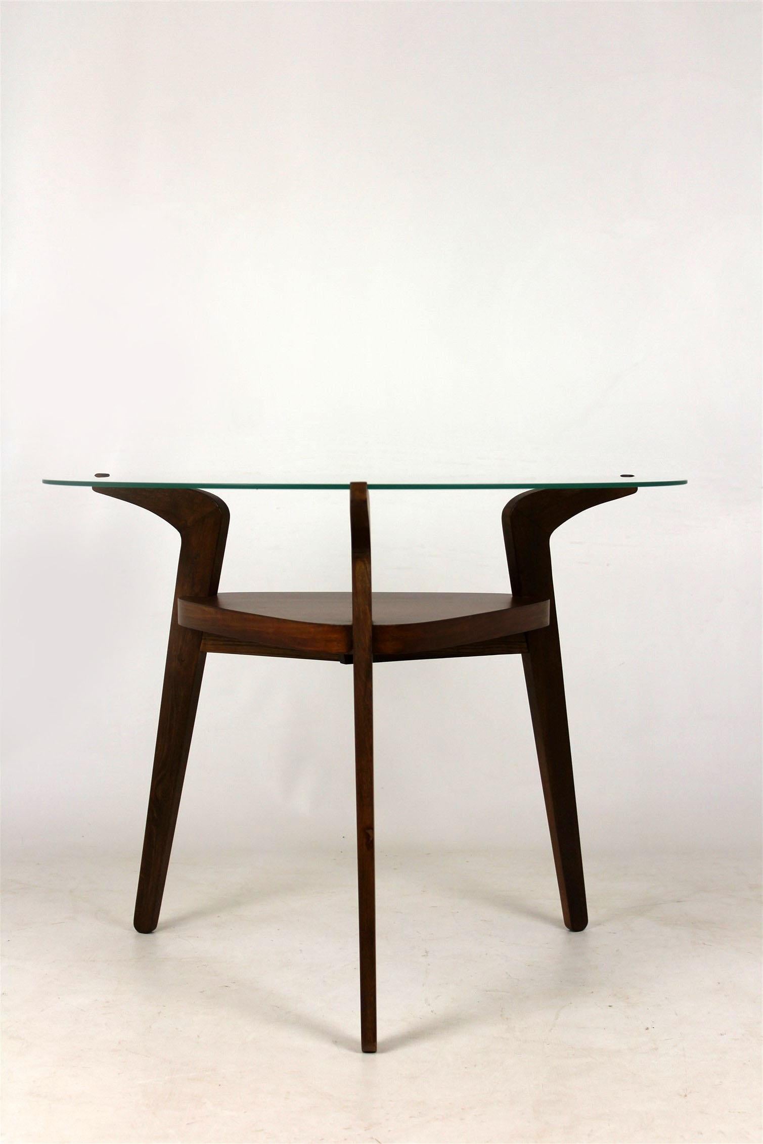 This coffee table was manufactured by Jitona in Czech Republic in 1960s.
It features oak veneered feet and a table-top made from glass.
Table is fully restored (lacquered woodwork and has got a brand new glass top).