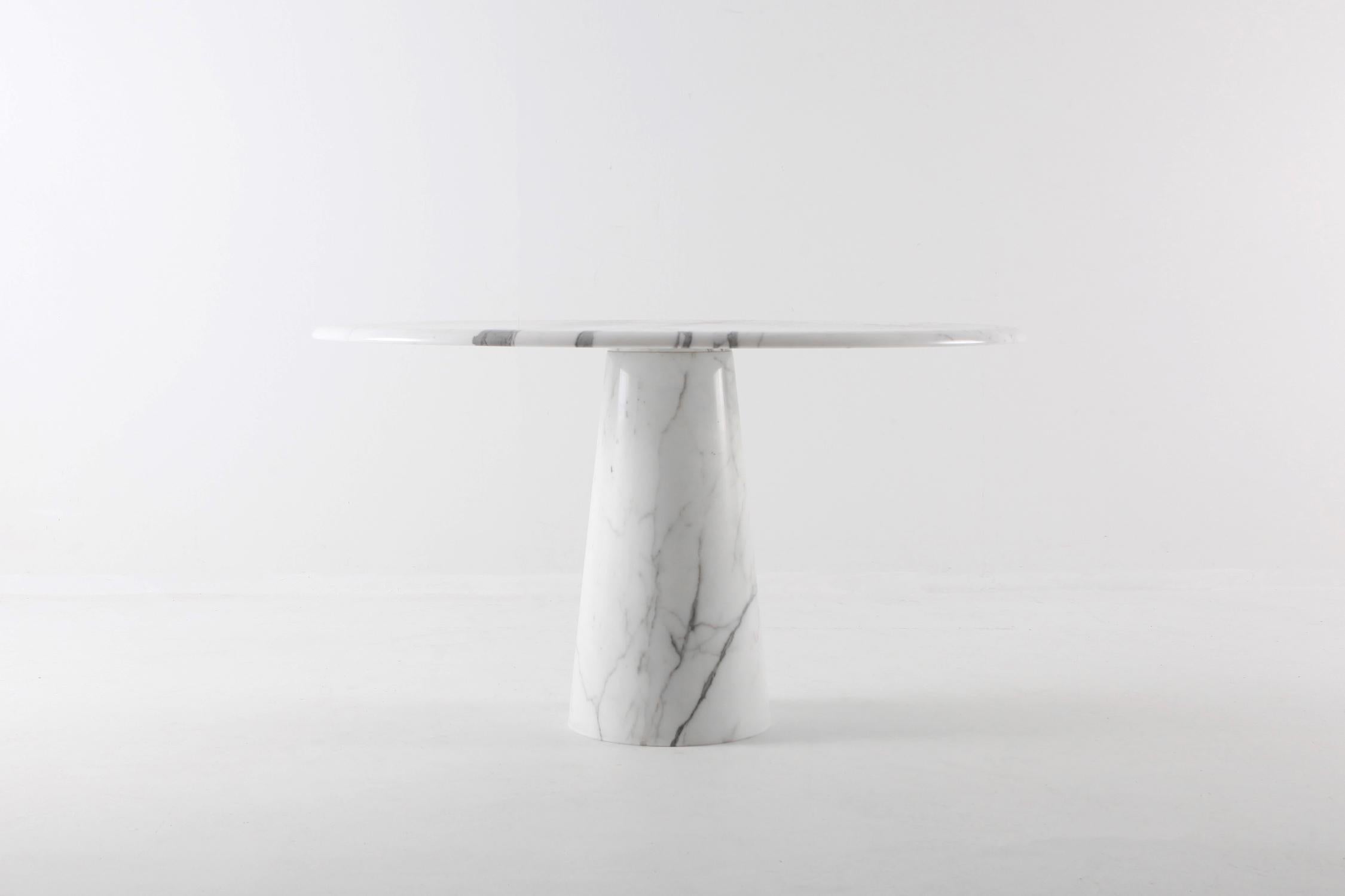 round carrara marble dining table