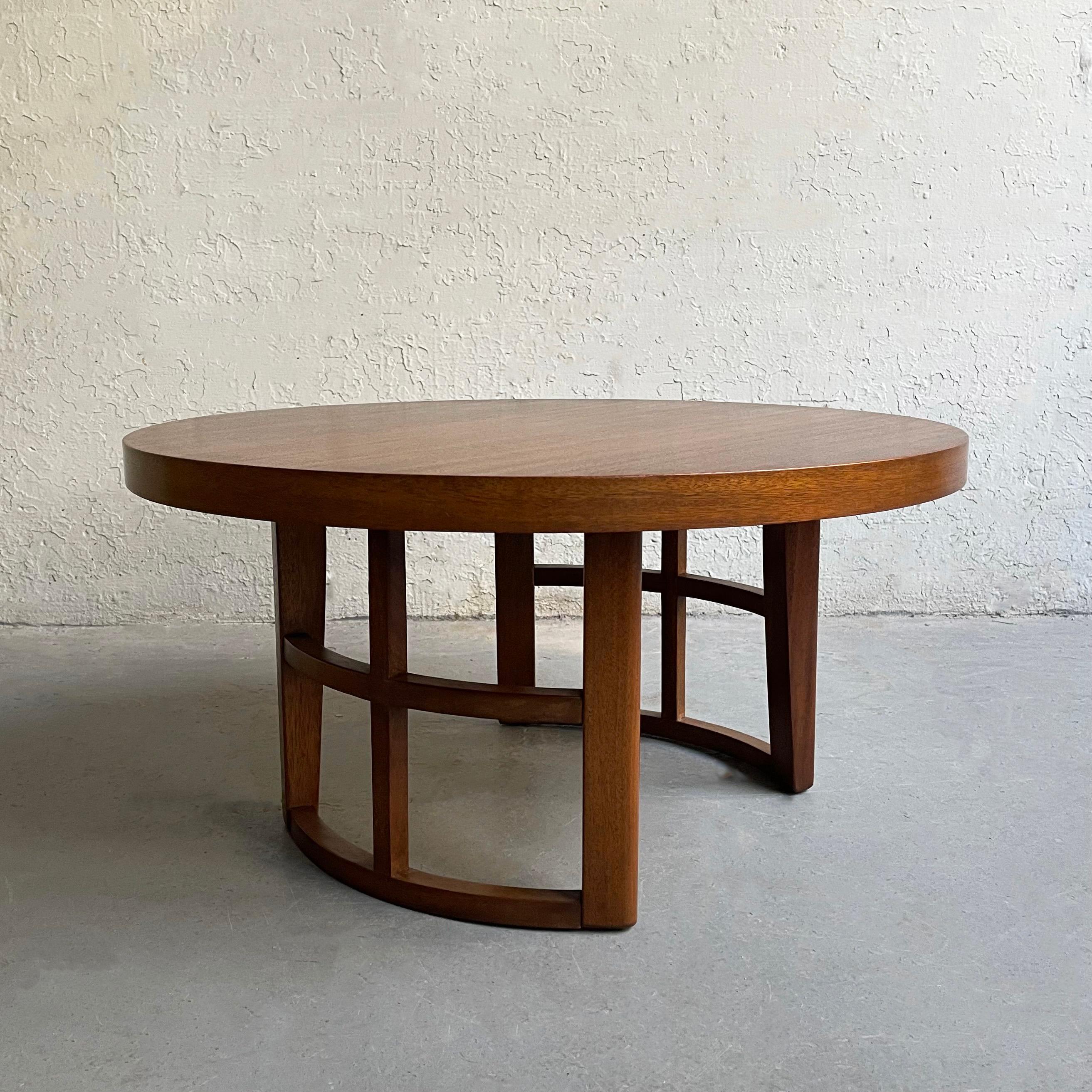 Mid-Century Modern, 30 inch round walnut coffee or side table features a curved lattice pedestal base. A modern take on craftsman style.
