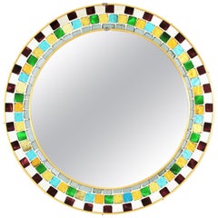 Specchio rotondo del Medioevo con cornice a mosaico in vetro multicolore