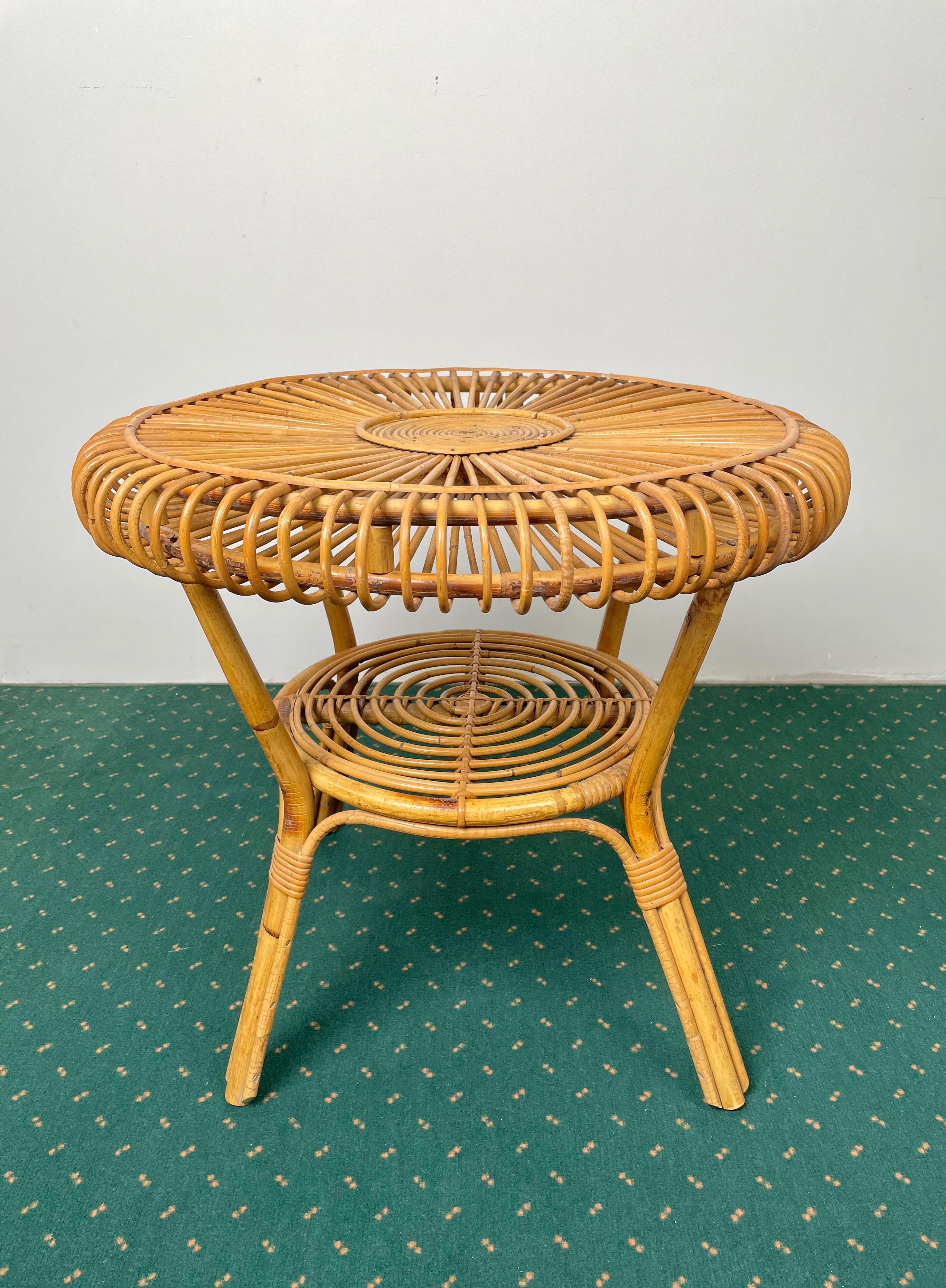 Mid-Century Modern round coffee table with double shelves completely in bamboo and rattan made in Italy in the 1960s.