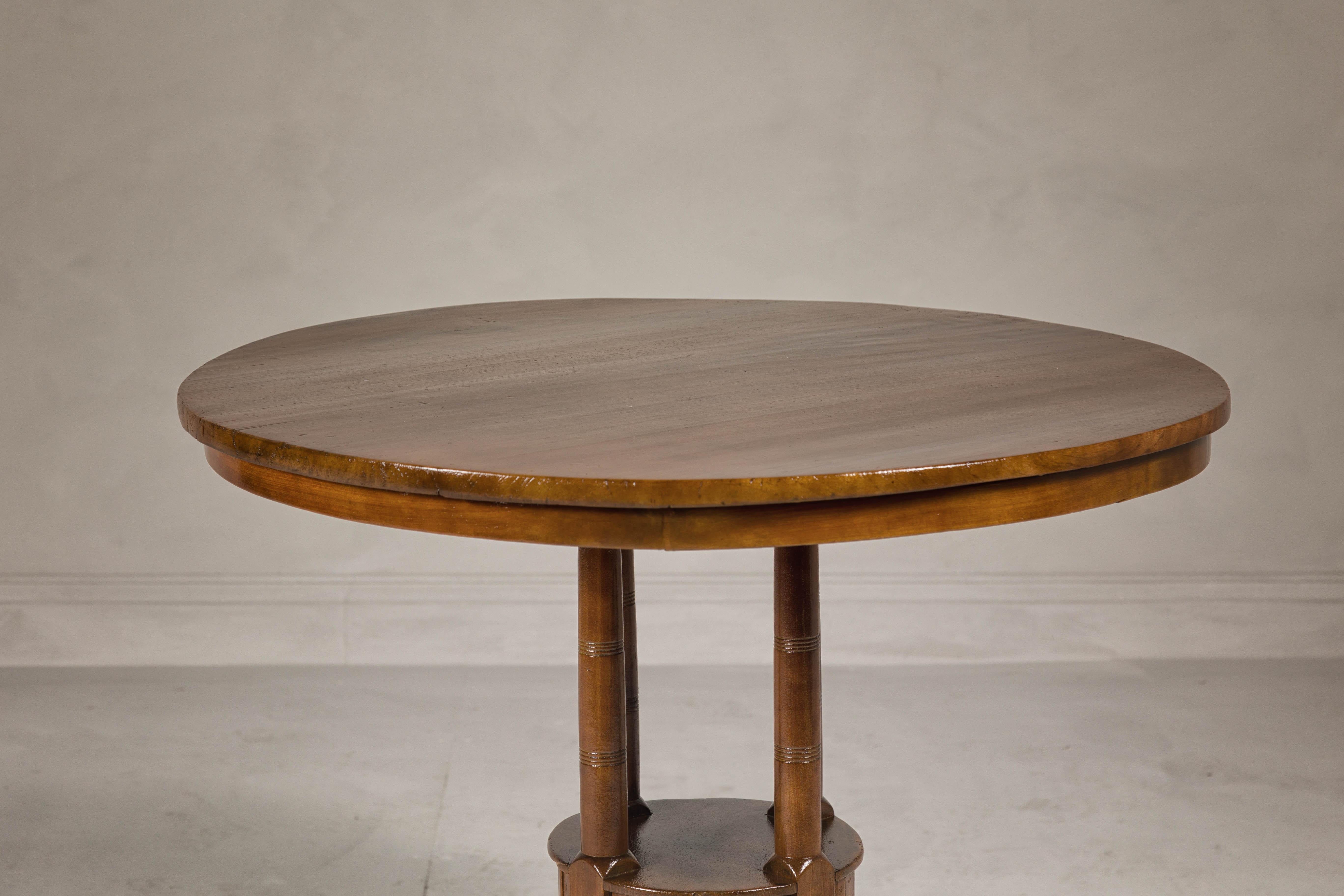 Indonesian Midcentury Round Top Side Table with Column Supports and Tambour Base For Sale