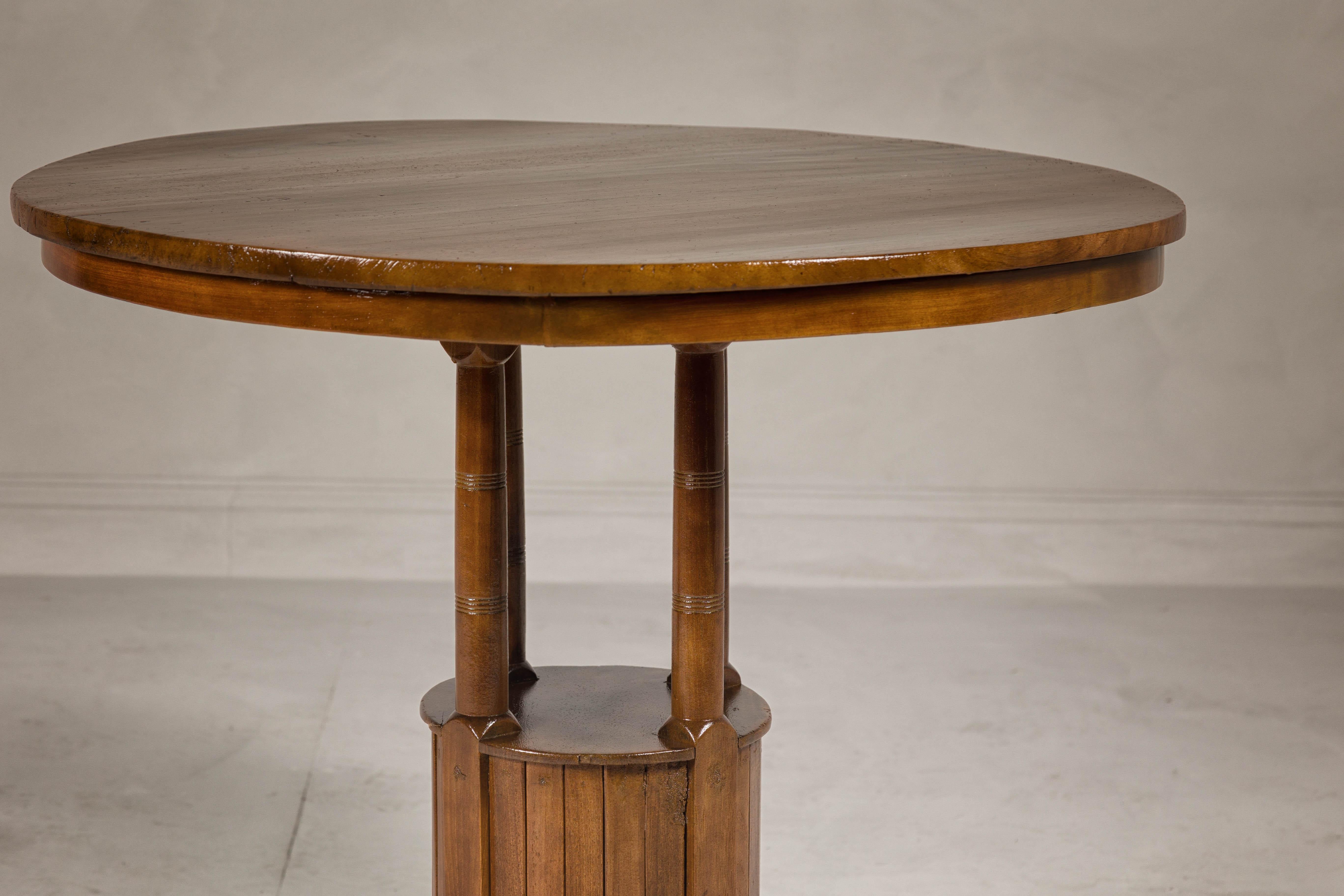 Turned Midcentury Round Top Side Table with Column Supports and Tambour Base For Sale