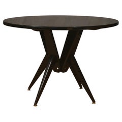 Runder Esstisch/Mitteltisch aus Holz, schwarzes Glas und Messing, Mid-Century, 1950