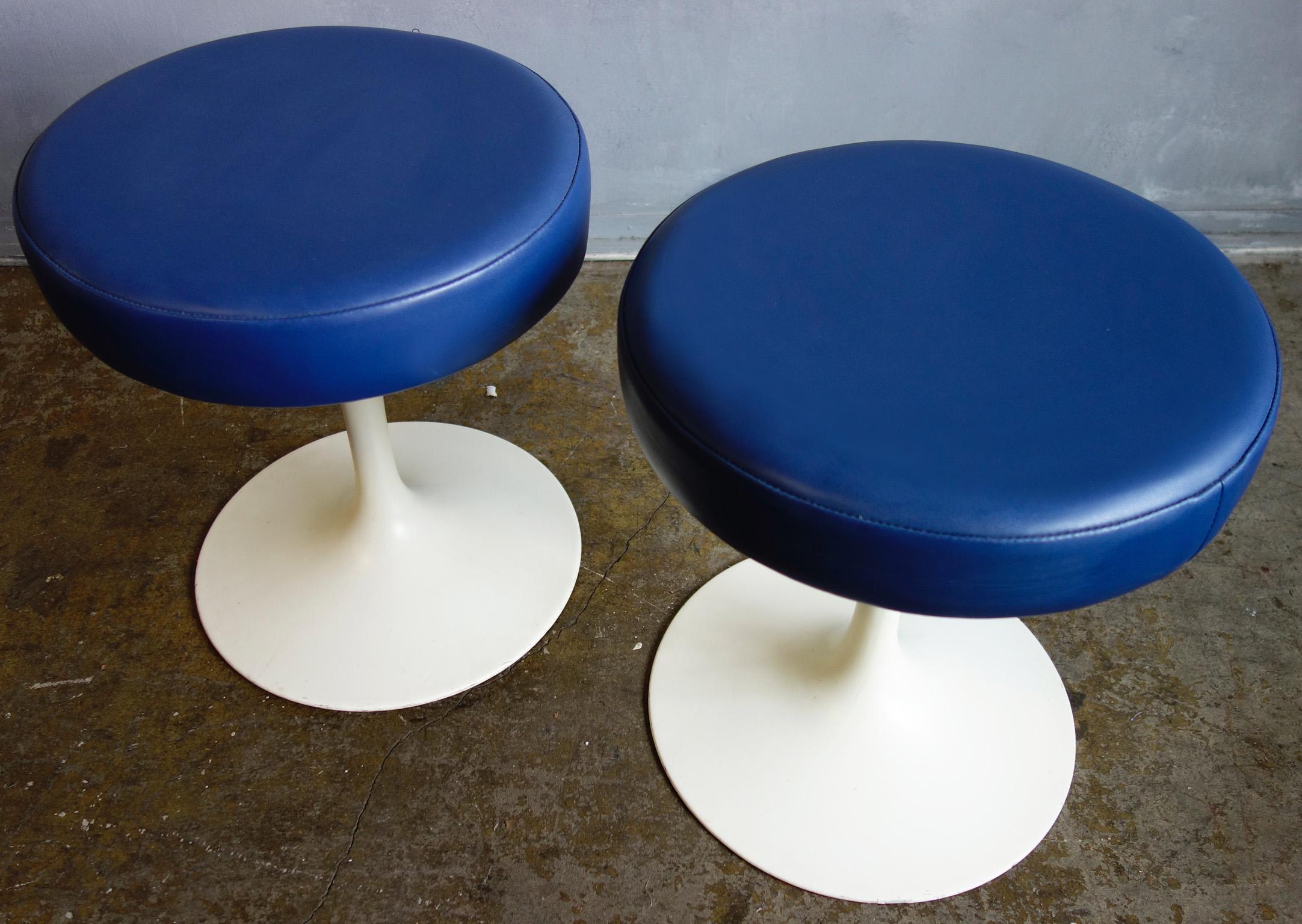 For your consideration are these midcentury tulip stools design by Saarinen. One of the most iconic design of the era-each stool is covered in blue upholstery and in good condition. Price per stool.