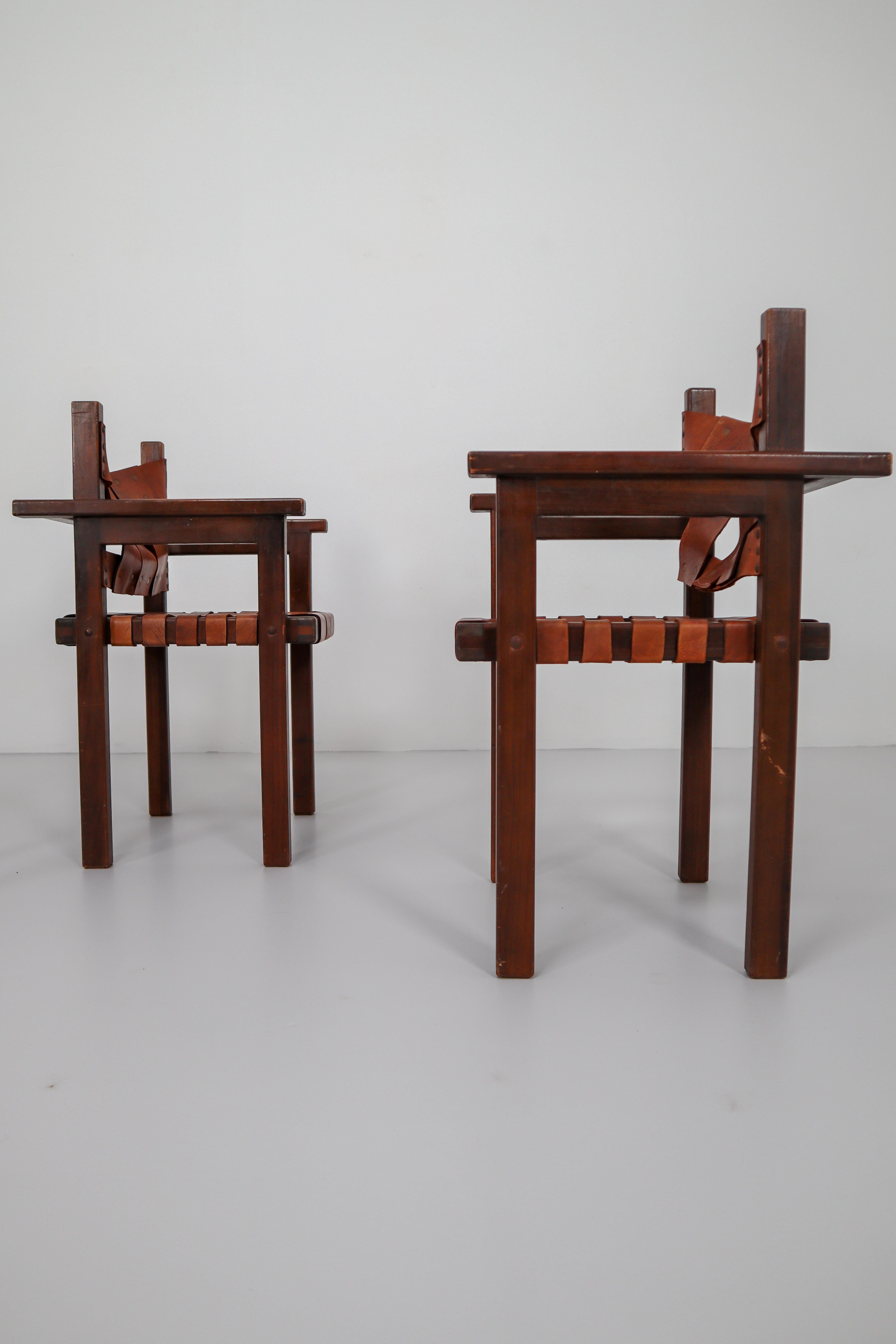 A set four of 1960s Safari chairs with cognac patinated leather. In very good vintage condition, with a lovely patina.
 