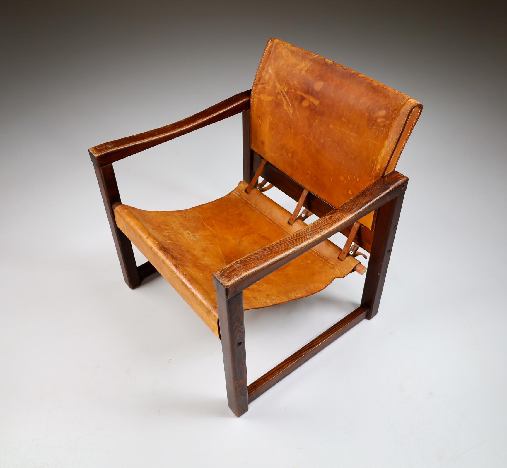 Scandinavian Modern Midcentury Safari Lounge Chair in Patinated Cognac Saddle Leather, 1970s