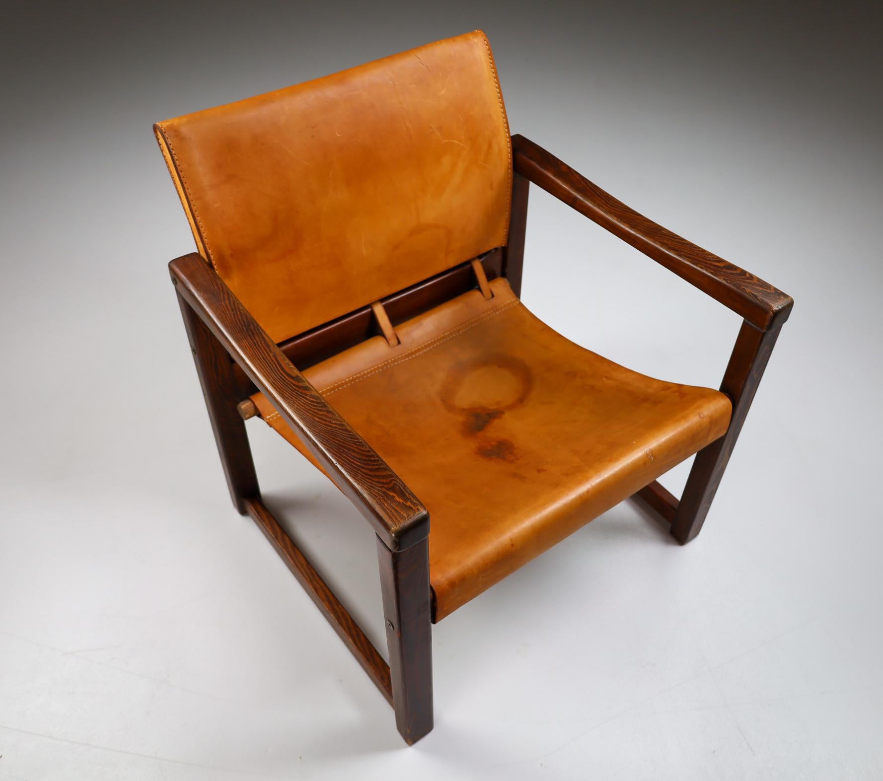 Scandinavian Modern Midcentury Safari Lounge Chair in Patinated Cognac Saddle Leather, 1970s