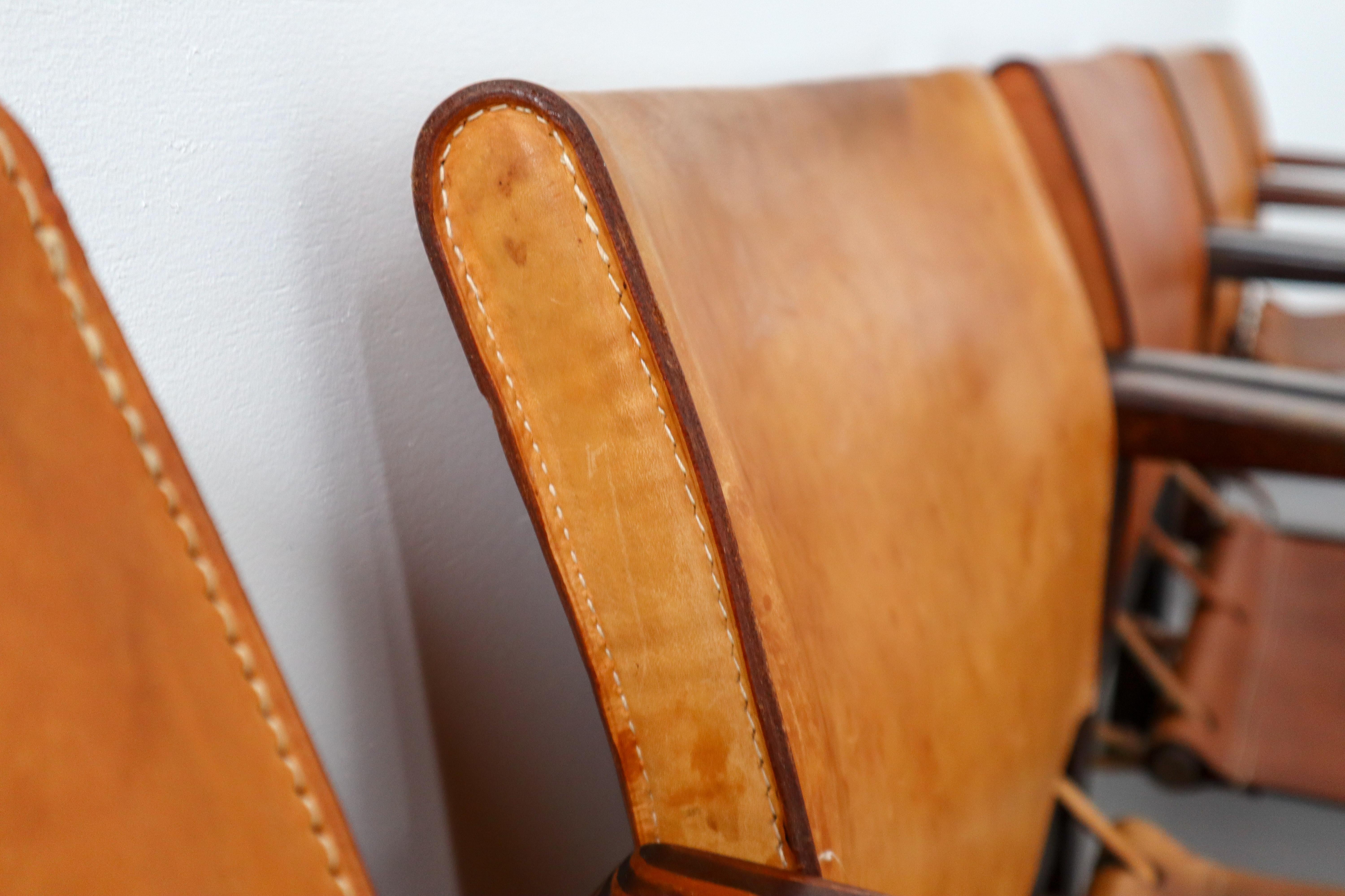 Midcentury Safari Lounge Chairs in Patinated Cognac Saddle Leather, 1970s 1