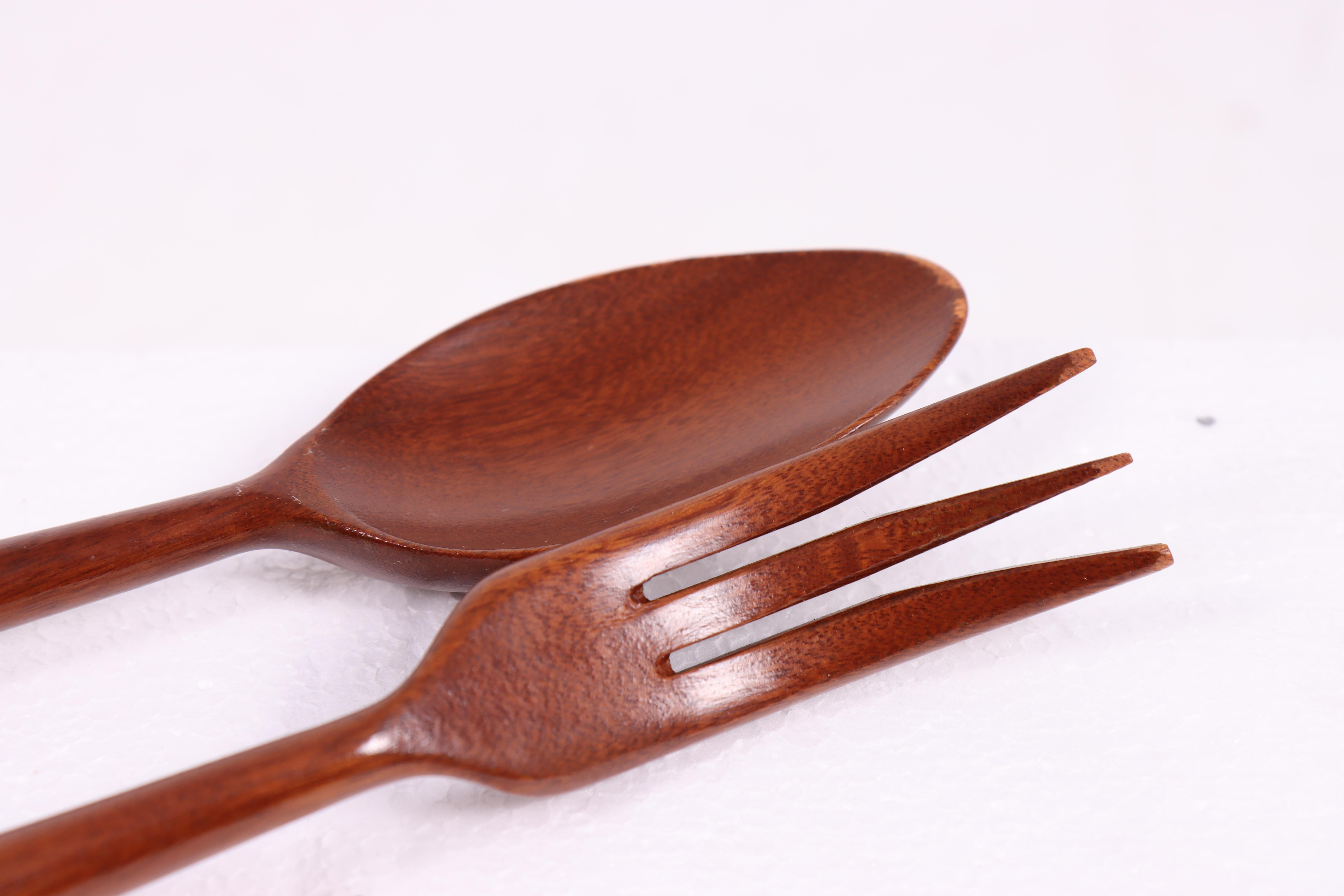 Midcentury salad cutlery in mahogany and sterling silver by Cartier. Made in France 1960s. Great original condition.