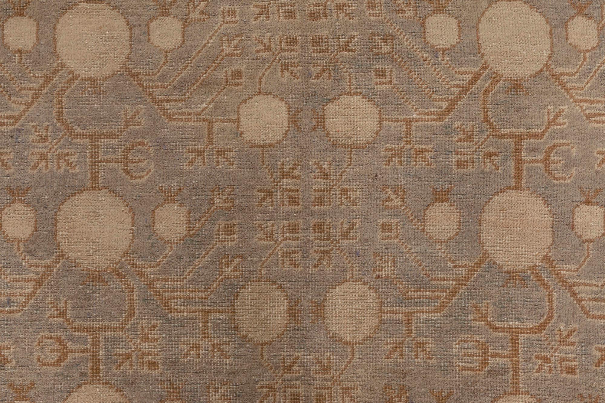 Midcentury Samarkand blue and brown handmade wool rug.
Size: 5'3