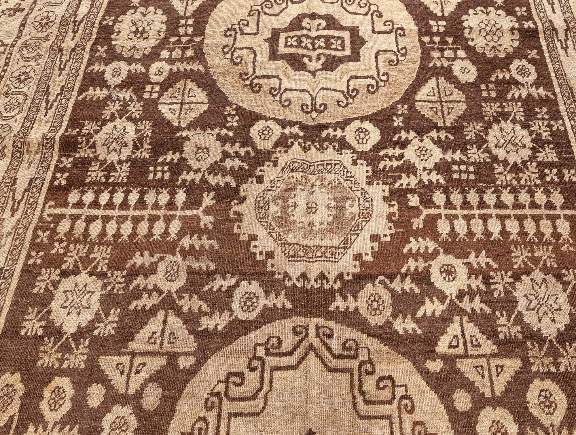 Midcentury Samarkand handmade wool rug.
Size: 6'7