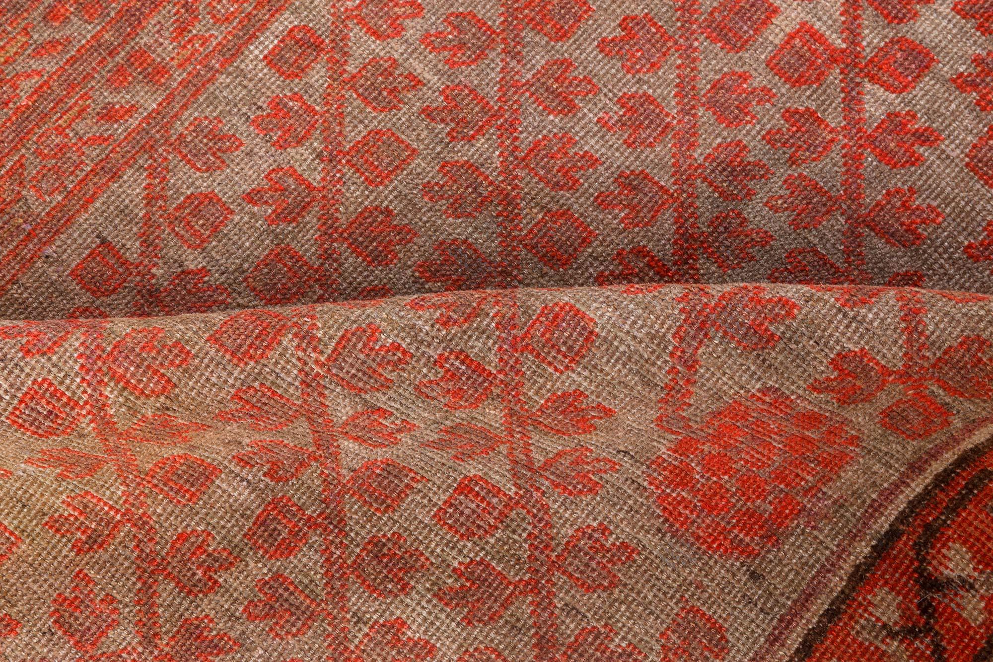 Midcentury Samarkand handmade wool rug
Size: 6'3