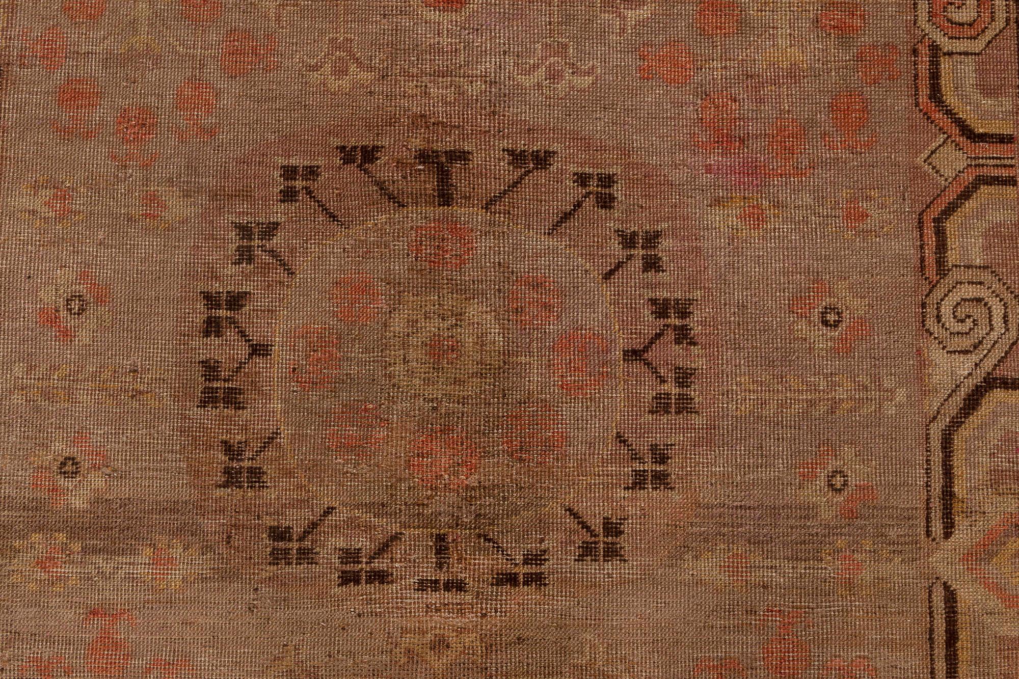 Midcentury Samarkand handmade wool rug.
Size: 4'8