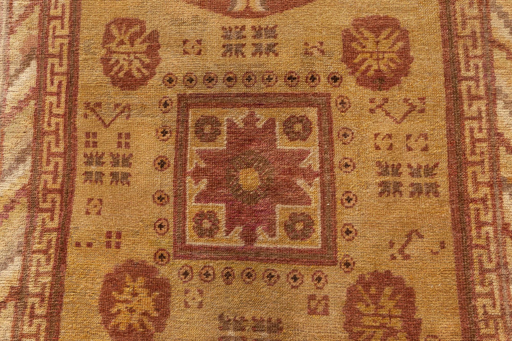 Midcentury Samarkand purple and yellow handmade wool rug.
Size: 3'8
