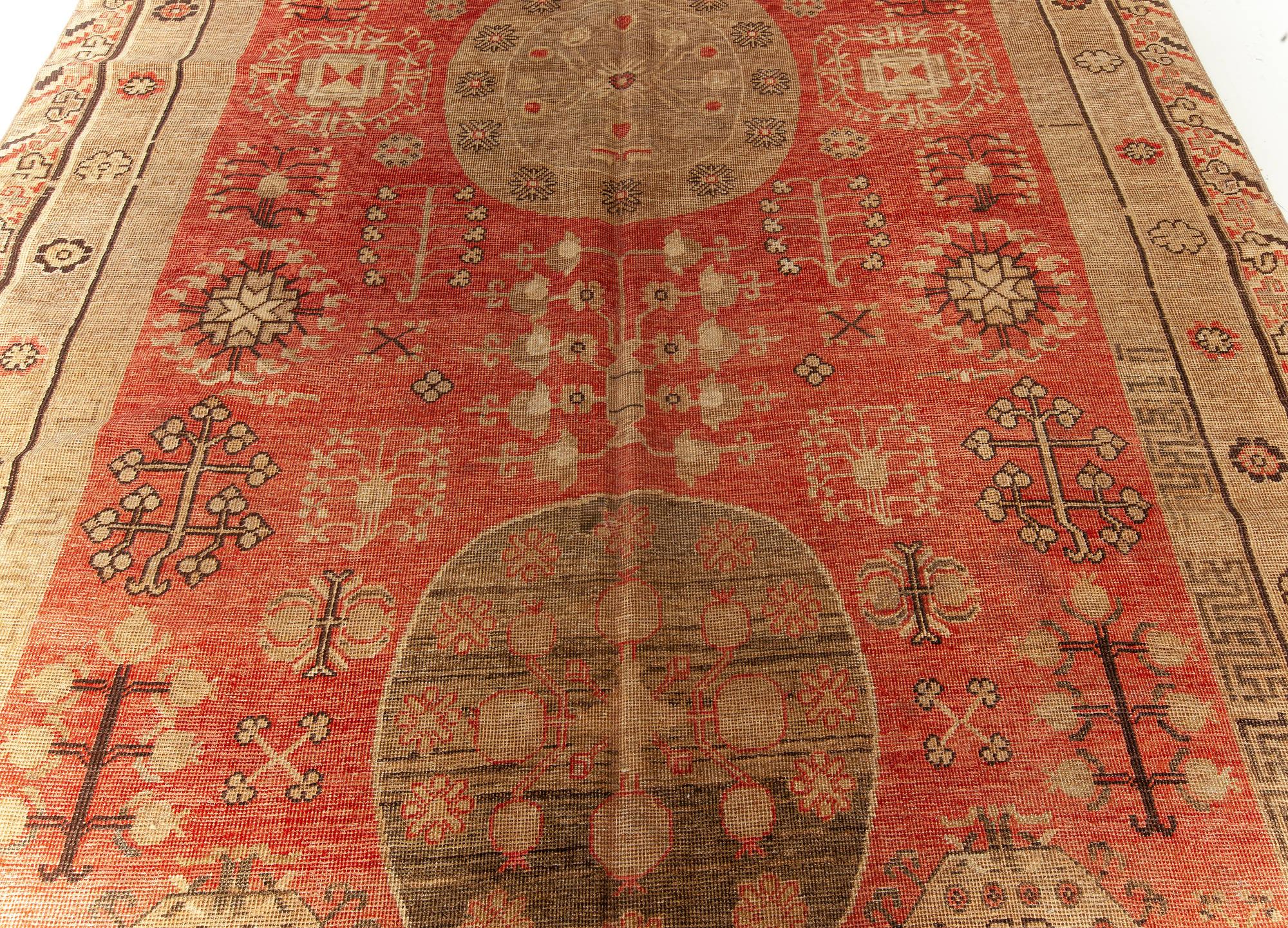 Midcentury Samarkand red and brown handmade wool rug.
Size: 6'4
