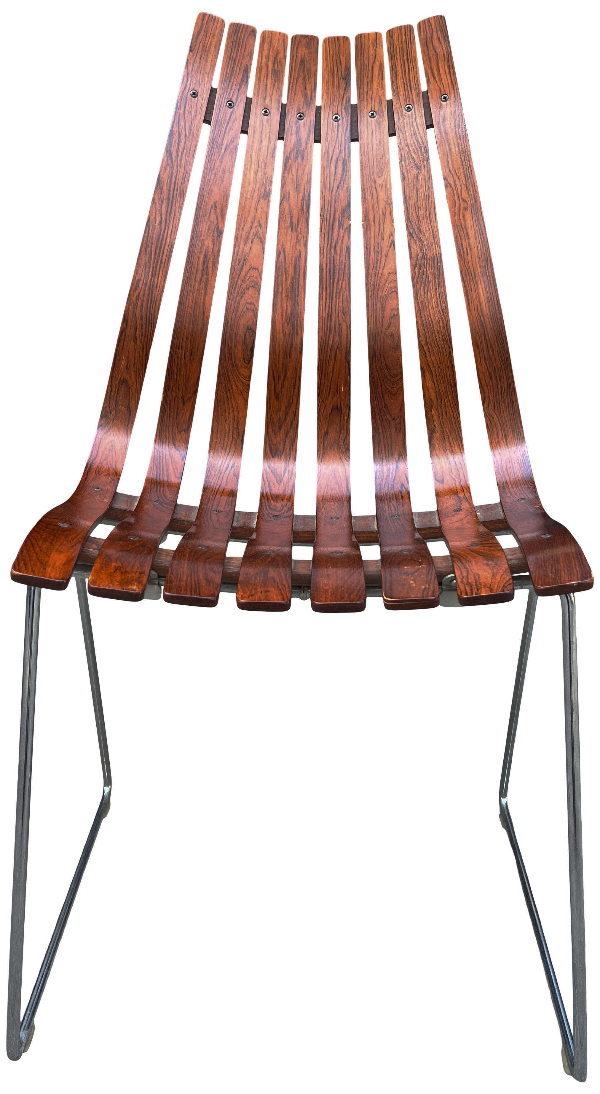 Beautiful example of Scandia high back dining chairs in excellent vintage condition. Rosewood slats on a chrome base. Chairs retain original label.
Norway, 1960s.

2 high back chairs are 37.5'' tall.