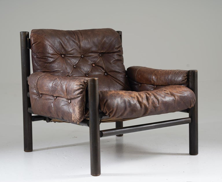 A pair of very rare safari chairs by Brukso / Stranda, Norway.
These chairs are not only a pleasure for the eye, but also very comfortable. They are upholstered in original chocolate-brown buffalo leather with a beautiful natural