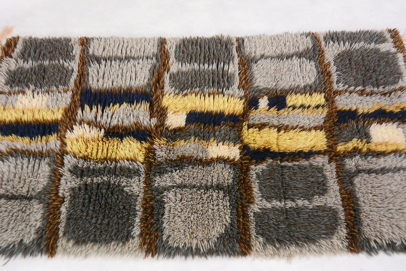 A Rya is a traditional Scandinavian wool rug with a long pile.
This rug features natural color palette of green, beige, grey, yellow and cobalt blue. I like it's blue accent - best delicate way to add color to your interior.