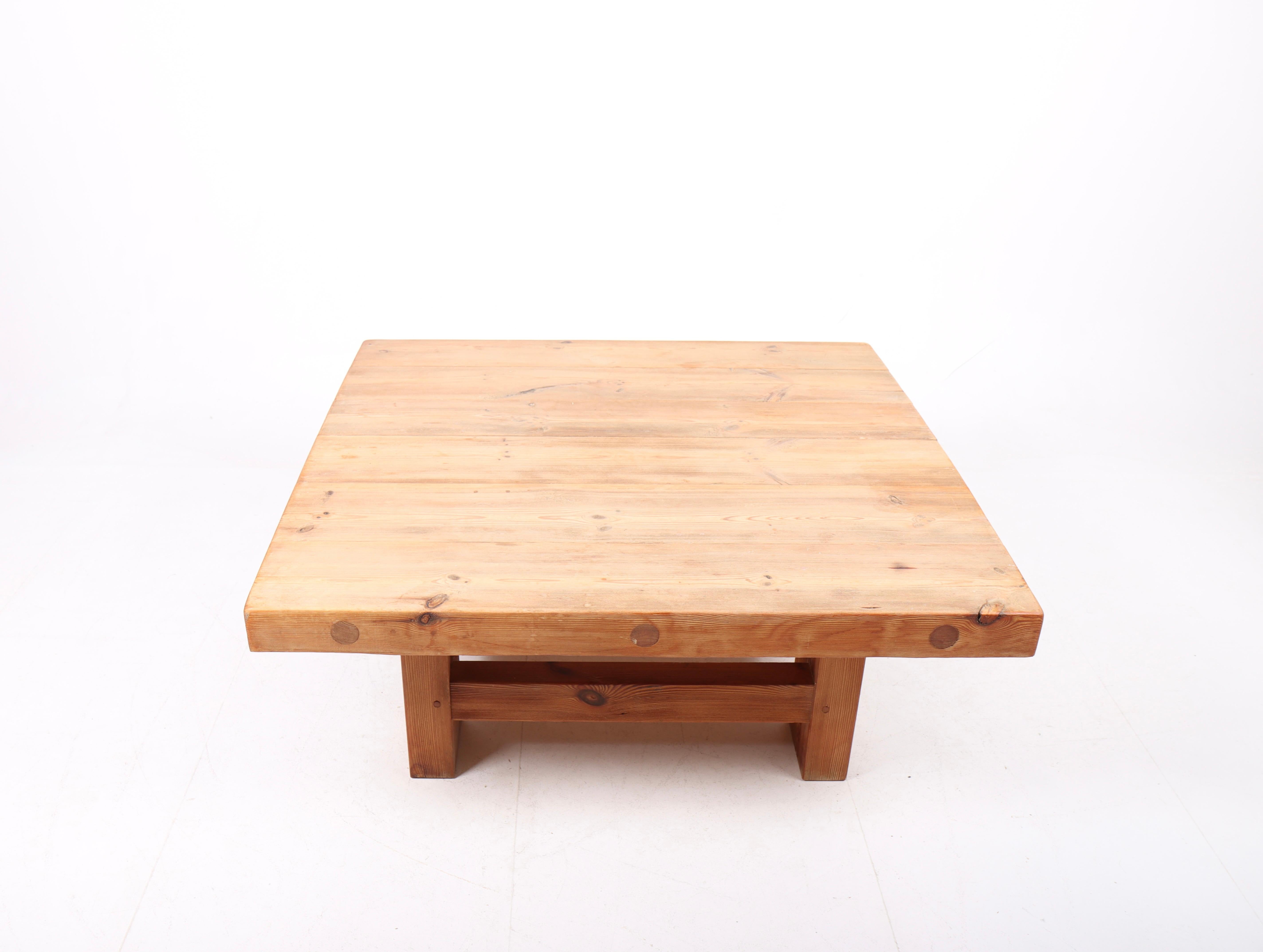 Low table in solid pine, made in Denmark in the 1950s. Great original condition.