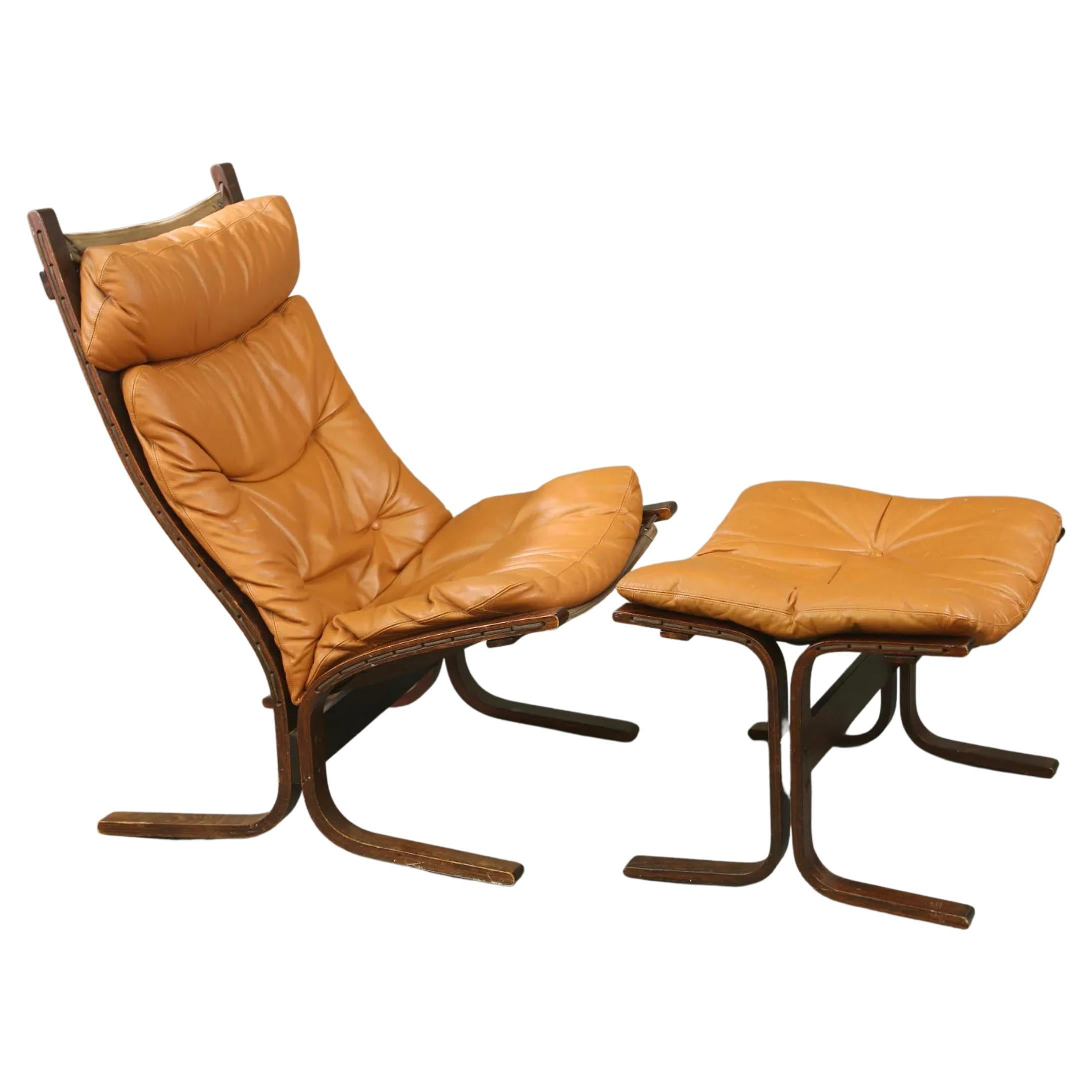 Midcentury Scandinavian Modern leather lounge chair and ottoman by Westnofa.

Westnofa Norwegian modern Tall Siesta chair and ottoman. Wooden frame, removable leather chair and ottoman cushions with Bentwood frame and cloth sling backing. Westnofa