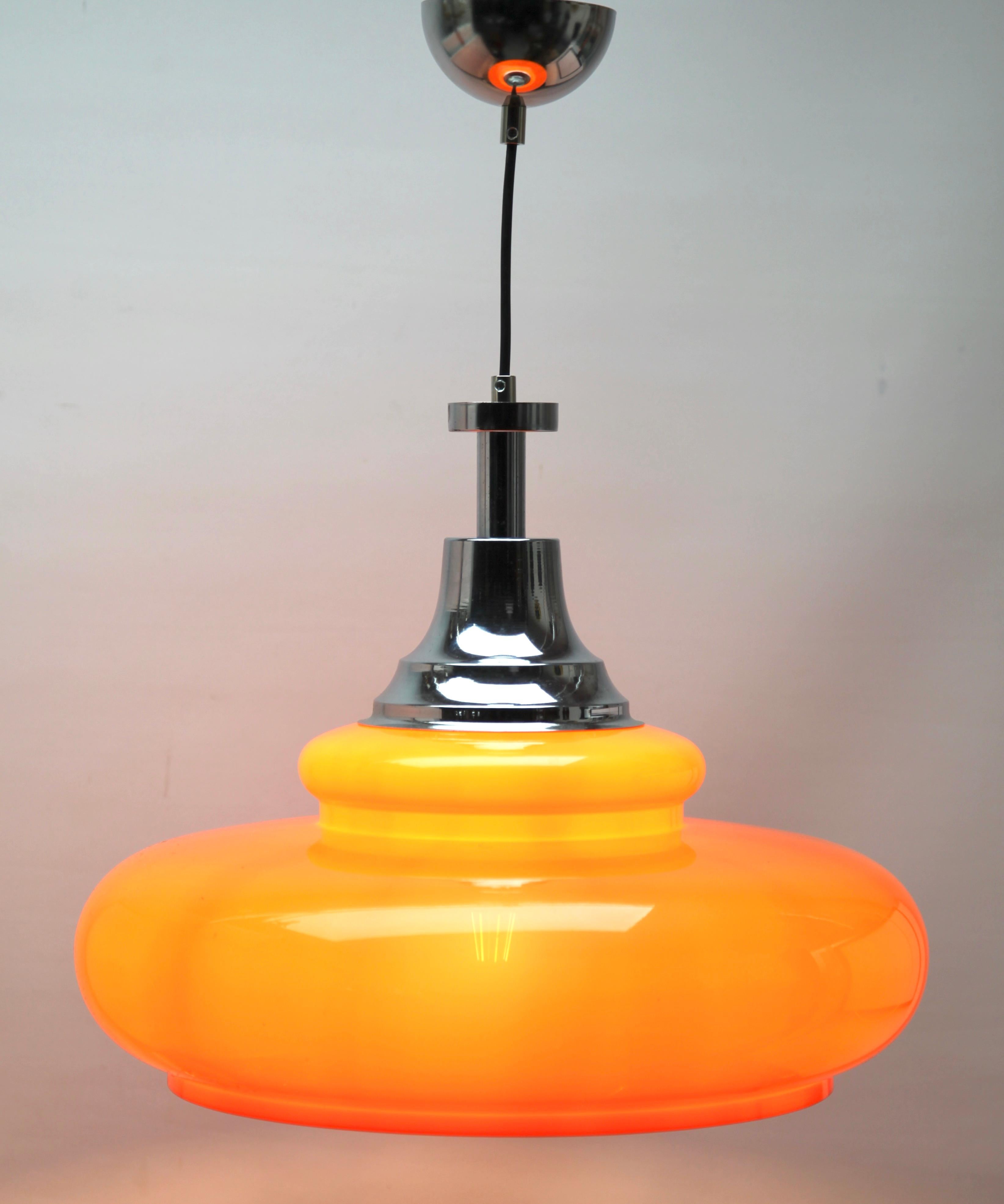 Hanging pendant light from the late 1960s designed in the Scandinavian style and Acrylic Shade 
Its Classic modernist form and simplicity in design, make it an iconic example of midcentury home lighting.
Size shade: Diameter 15.76 -inch