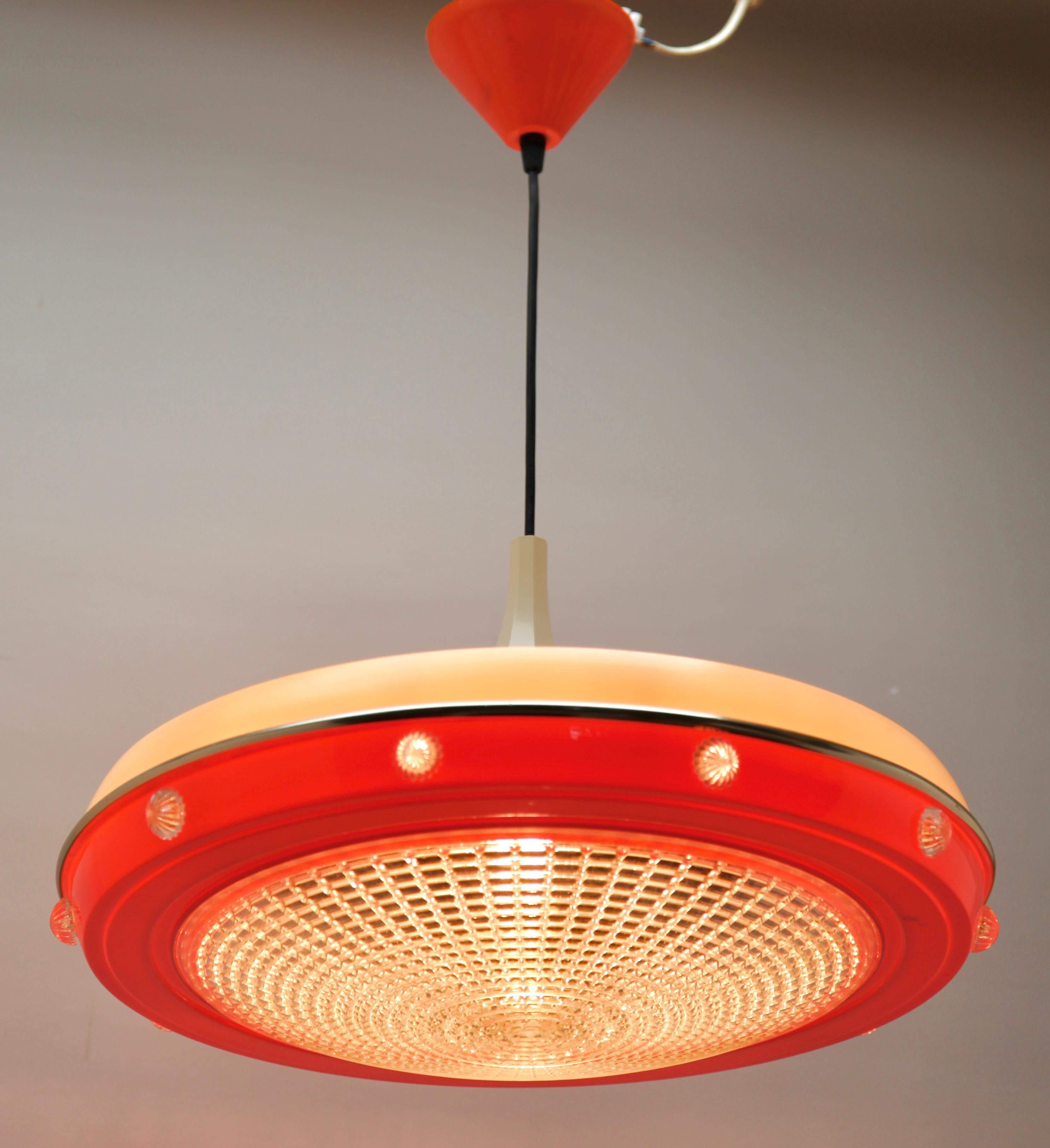 Hanging pendant light from the late 1960s designed in the Scandinavian style and Acrylic Shade 
Its Classic modernist form and simplicity in design, make it an iconic example of midcentury home lighting.
Size shade: Diameter 17.71 -inch