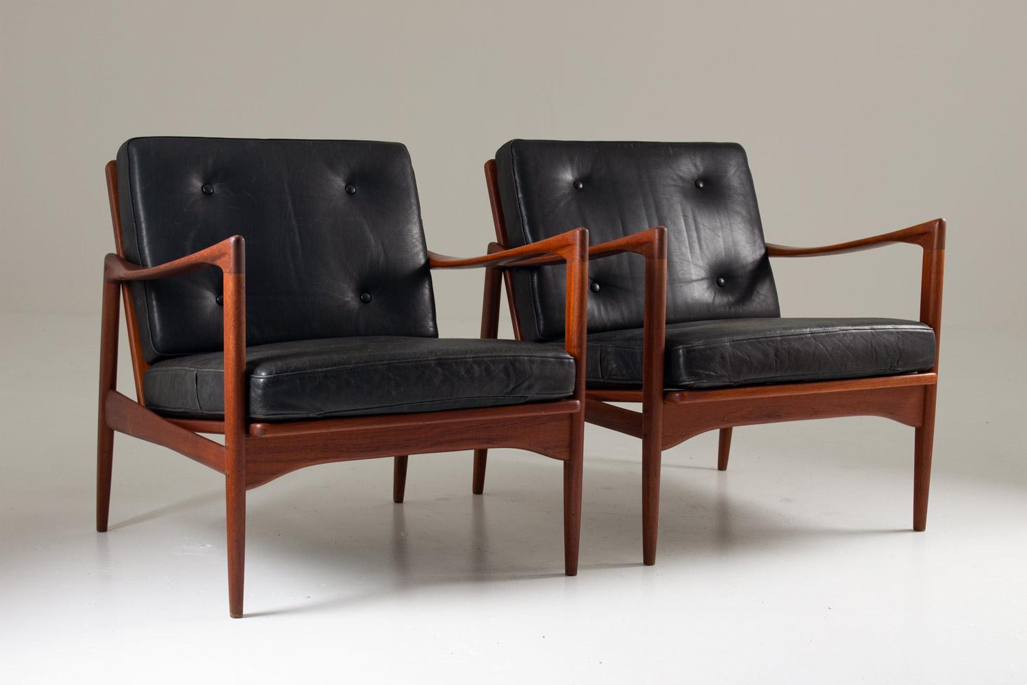 A rare seating group consisting of three lounge chairs and one sofa, model 