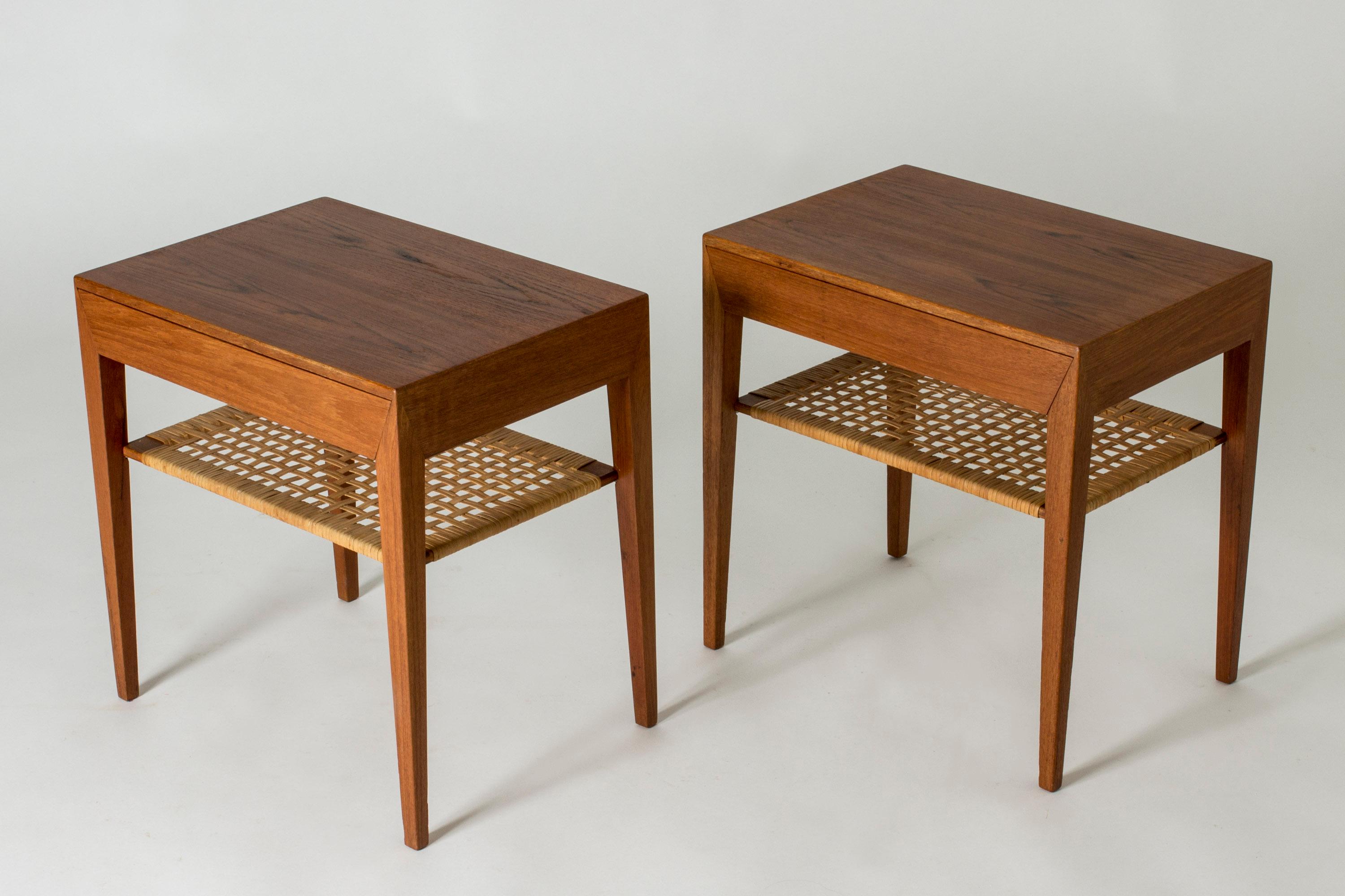 Pair of mahogany bedside tables by Severin Hansen with drawers and rattan shelves under the table tops. Severin Hansen’s characteristic diagonal, seamless joinery at the corners.