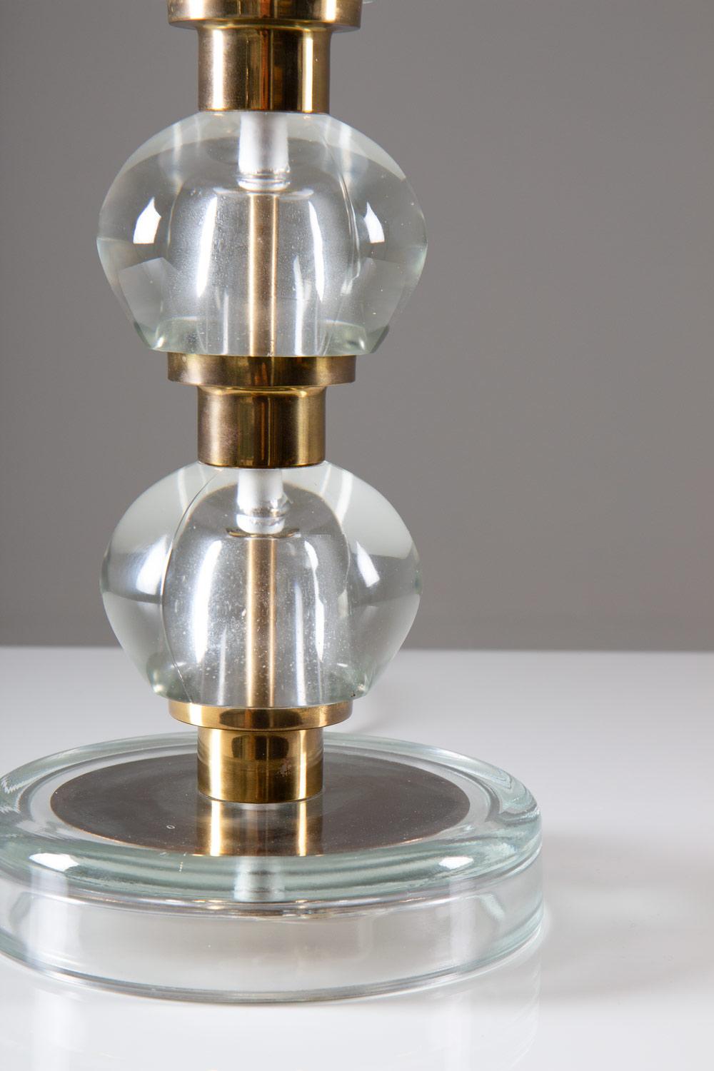 Beautiful table lamp in glass with details in brass, manufactured by NAFA, Sweden. 

Condition: Very good condition, one small crack in the upper brass ring, see picture. 

New shade included.