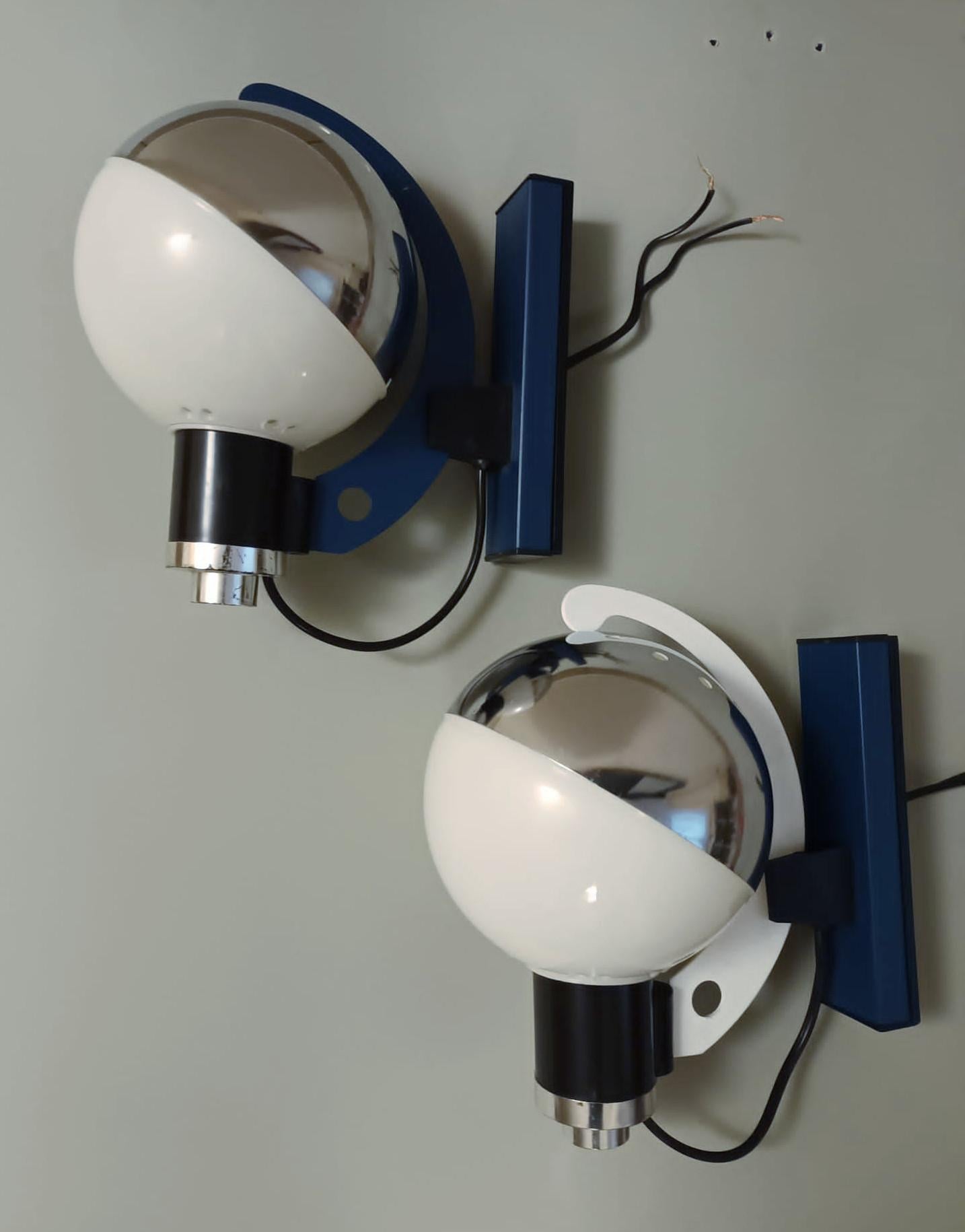 Vintage Italian wall lights with opaline white glass balls mounted on metal frames in blue and white / Made in Italy, circa 1960s
Measures: height 9 inches, width 5.5 inches, depth 8 inches
1 light / E12 or E14 type / max 40W
2 available in stock in