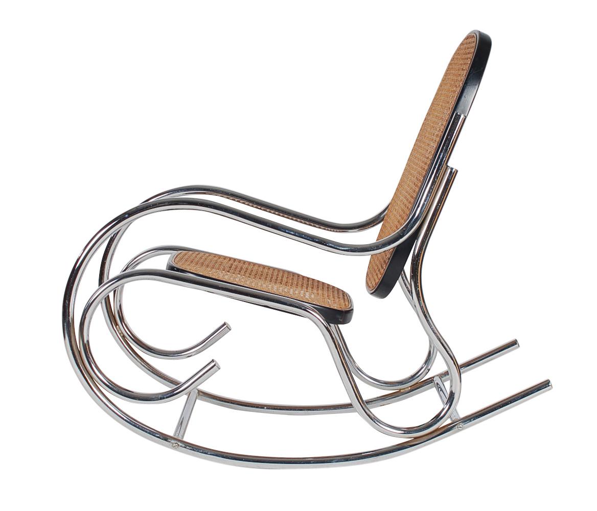 An awesome chrome scrolled rocker, giving a Classic a fresh modern look. It features a sturdy chrome tubular frame with wood framed caning seat and backrest. Clean damage free condition. Ready for immediate use.