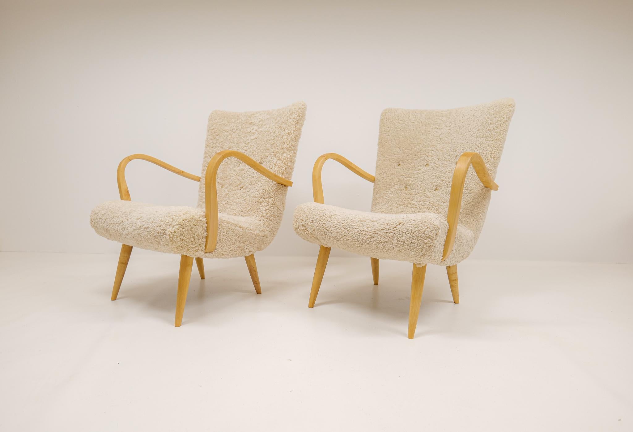 These lovely sculptured easy/lounge chairs were made in the 1940-50 s Sweden and are attributed to designer G.A. Berg.
The arms and legs are made in birch that has been refinished and gives a good look to the shape of the chairs that are newly