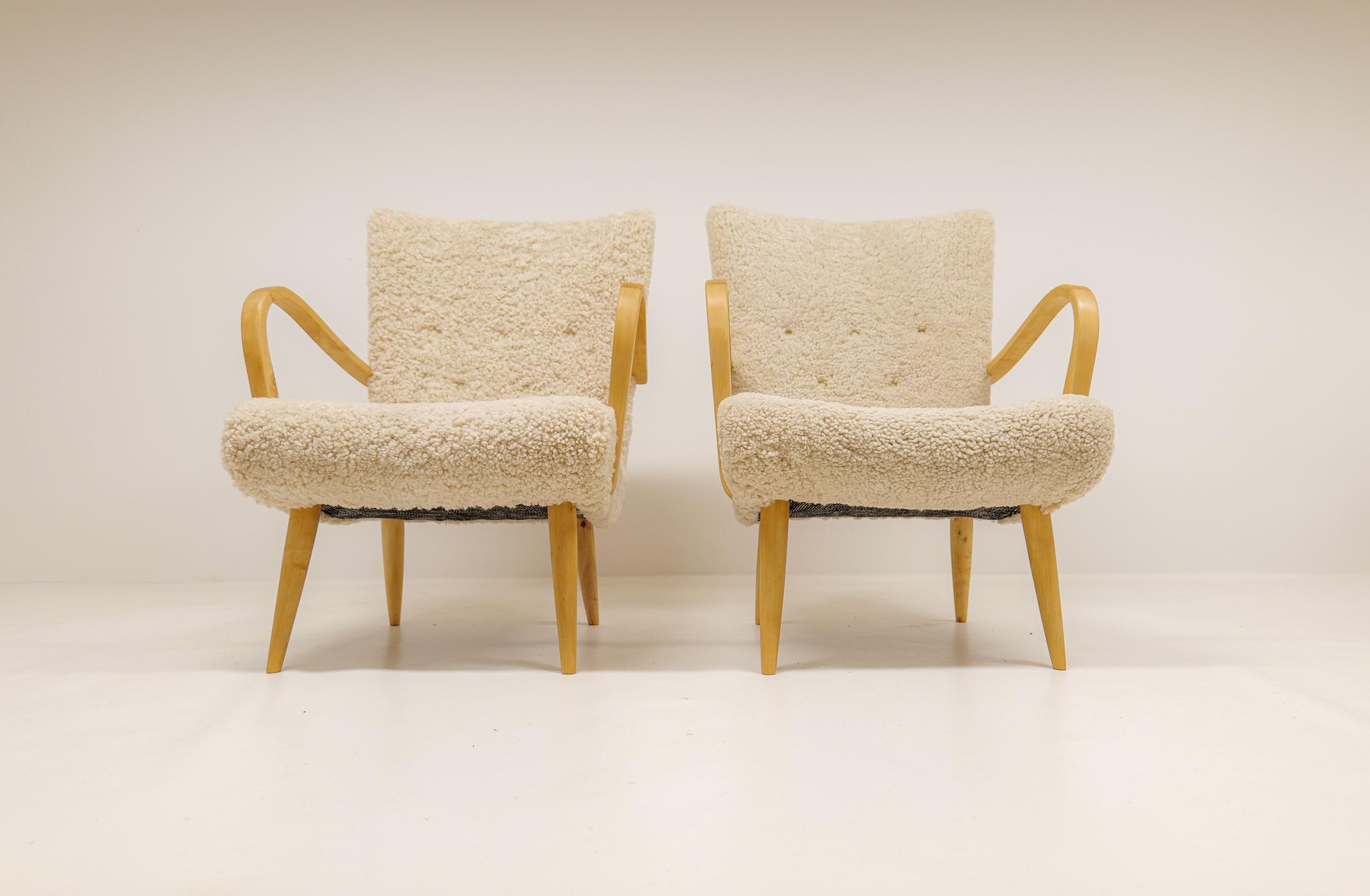 Midcentury Sculptural Lounge Chairs in Sheepskin Shearling Sweden 1950s 2