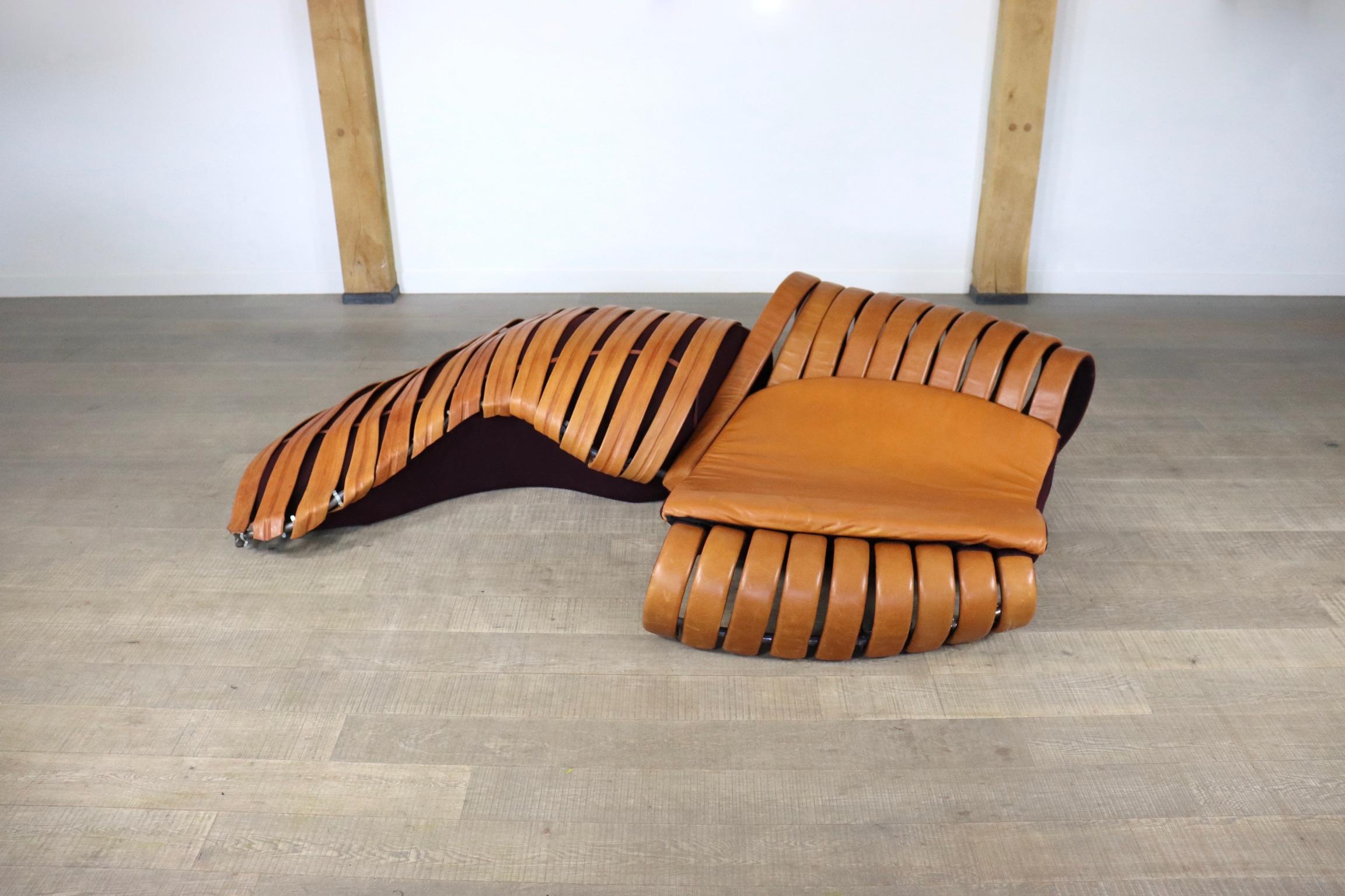 Steel Midcentury Sculptural lounge sofa in cognac leather, France 1980s