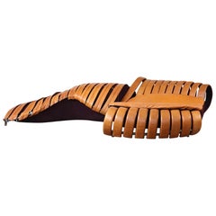 Midcentury Sculptural lounge sofa in cognac leather, France 1980s