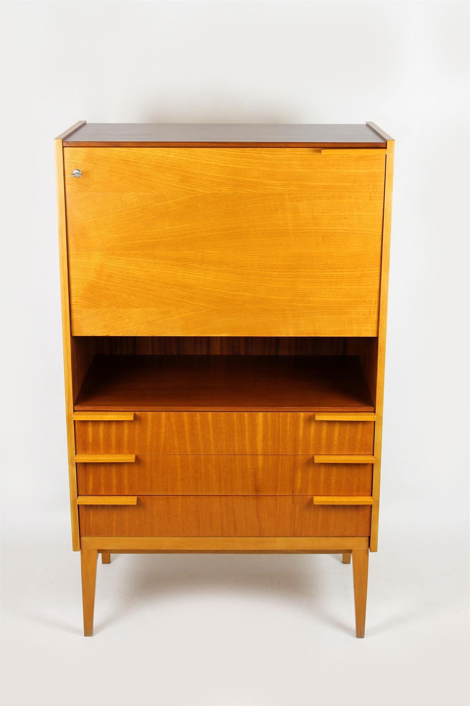 Midcentury secretary desk, designed by František Mezulaník for UP Bucovice in former Czechoslovakia in the 1960s. Features three drawers and five shelf dividers.