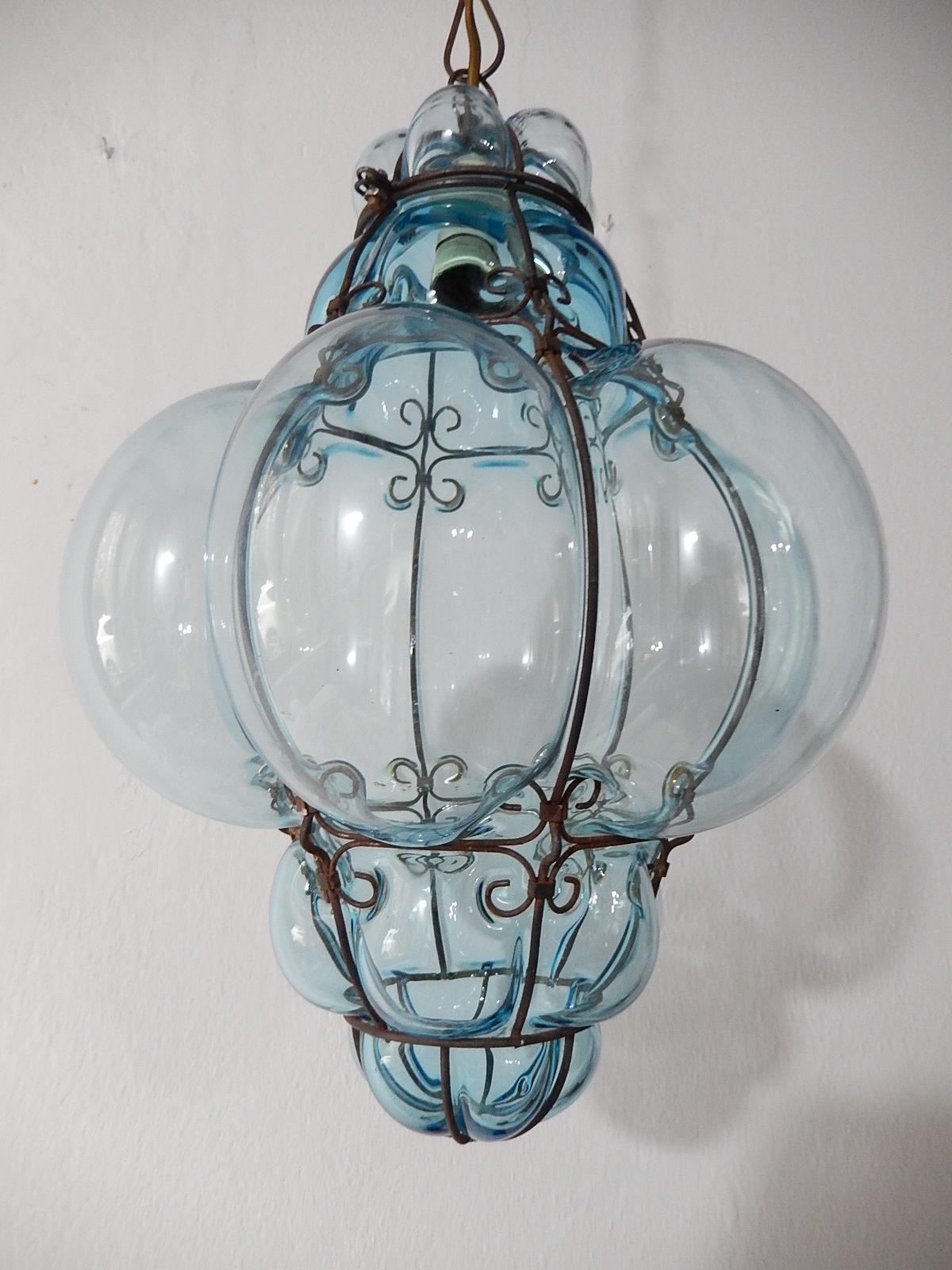 Housing one-light. Rare aqua Murano blown glass. Great craftsmanship. Re-wired and ready to hang. Free priority shipping from Italy. Adding another 20 inches (can be shortened) of original chain and canopy.
