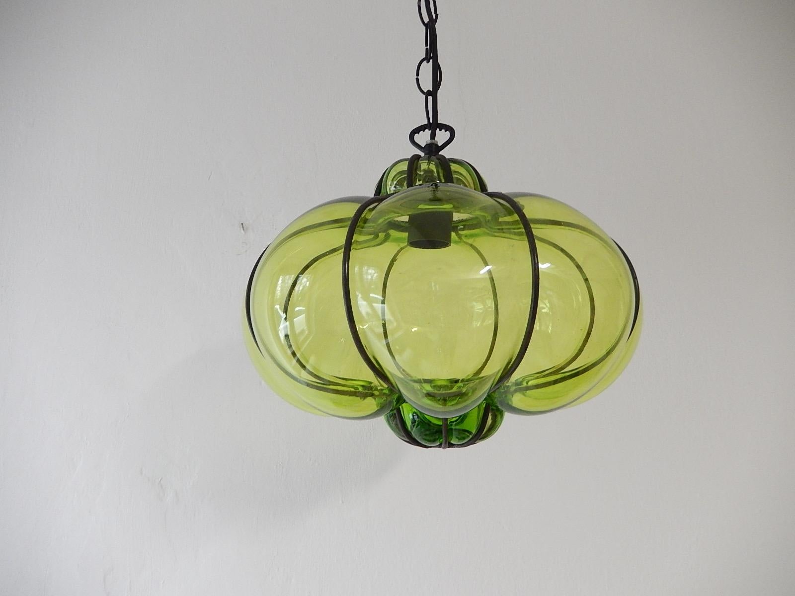 Housing one-light. Rare green Murano blown glass. Great craftsmanship. Re-wired and ready to hang with appropriate socket. Rare shape. Free priority UPS shipping from Italy, no custom fees. Adding another 20 inches of original chain and canopy.