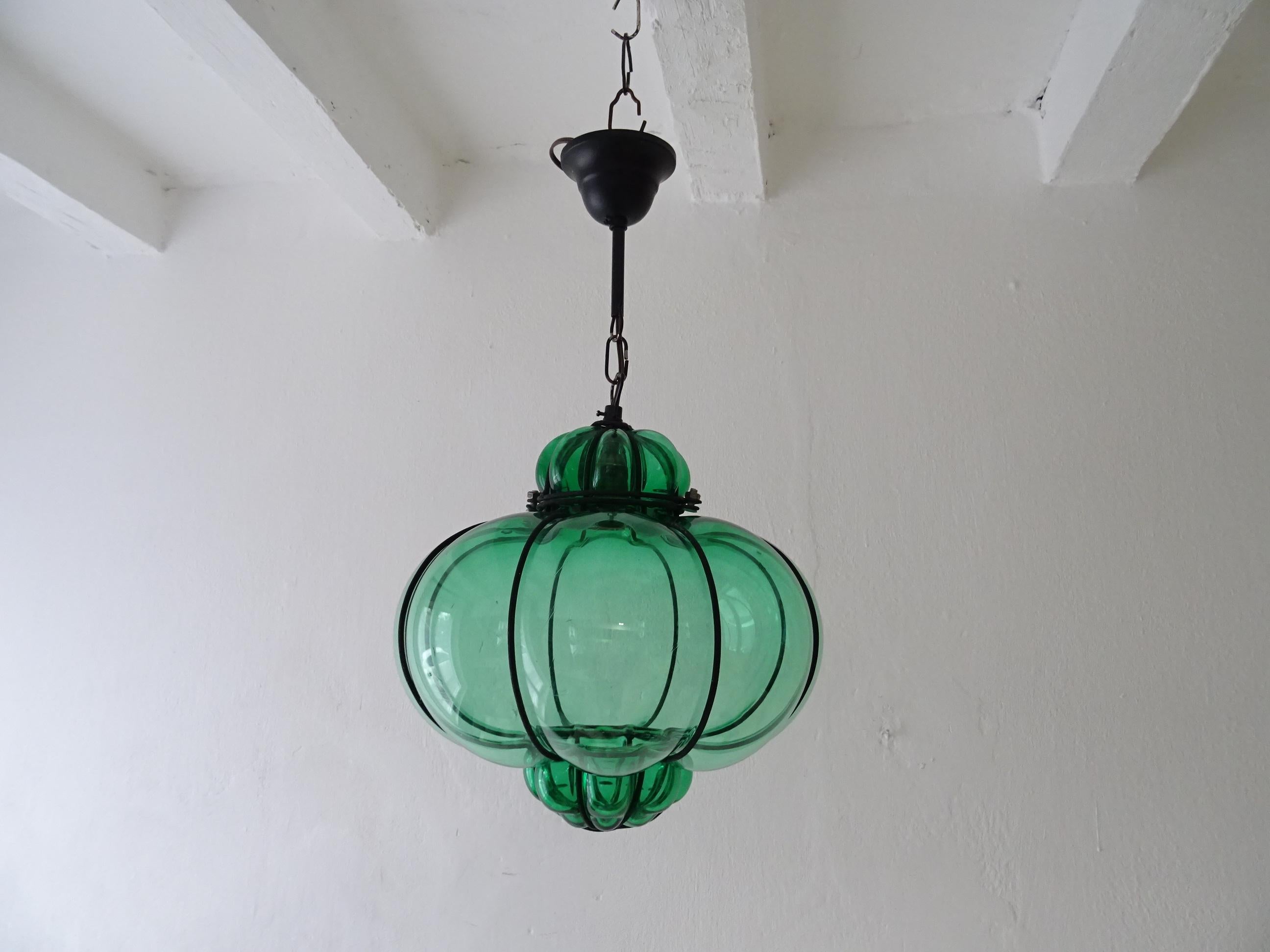Housing one-light. Rare green Murano blown glass. Great craftsmanship. Re-wired and ready to hang with appropriate certified UL US socket. Rare shape. Free priority UPS shipping from Italy, no custom fees. Adding another 7 inches of original chain