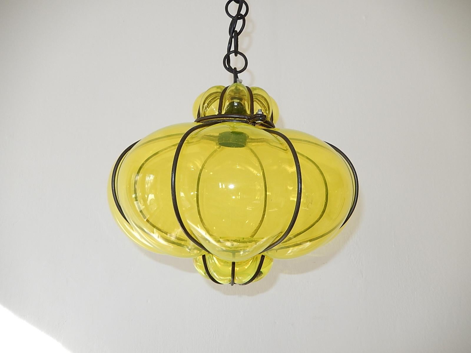 Housing one-light. Rare neon yellow Murano blown glass. Great craftsmanship. Re-wired and ready to hang with appropriate socket. Rare shape. Free priority UPS shipping from Italy. Adding another 14 inches of original chain and canopy.