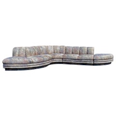 Mid-Century Serpentine Channel Back Sofa with Ottoman in the Style of Baughman