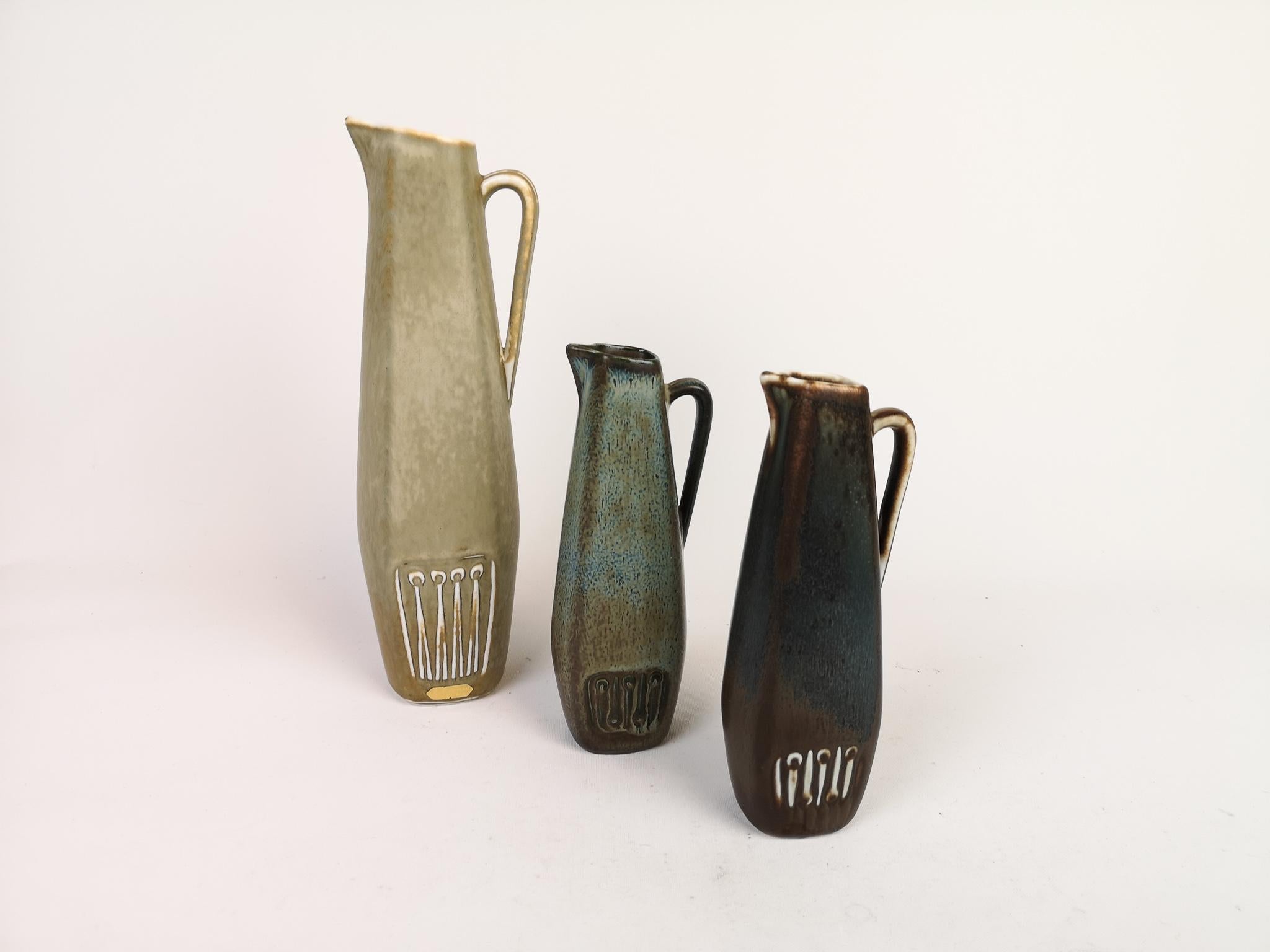 Three wonderful pieces made in Sweden during the 1950s at Rörstrand factory and designed by Gunnar Nylund

The vases have nice antique look in a modern shape. The vases are nicely sculptured and have a nice glaze.

Good condition. 

Measures:
