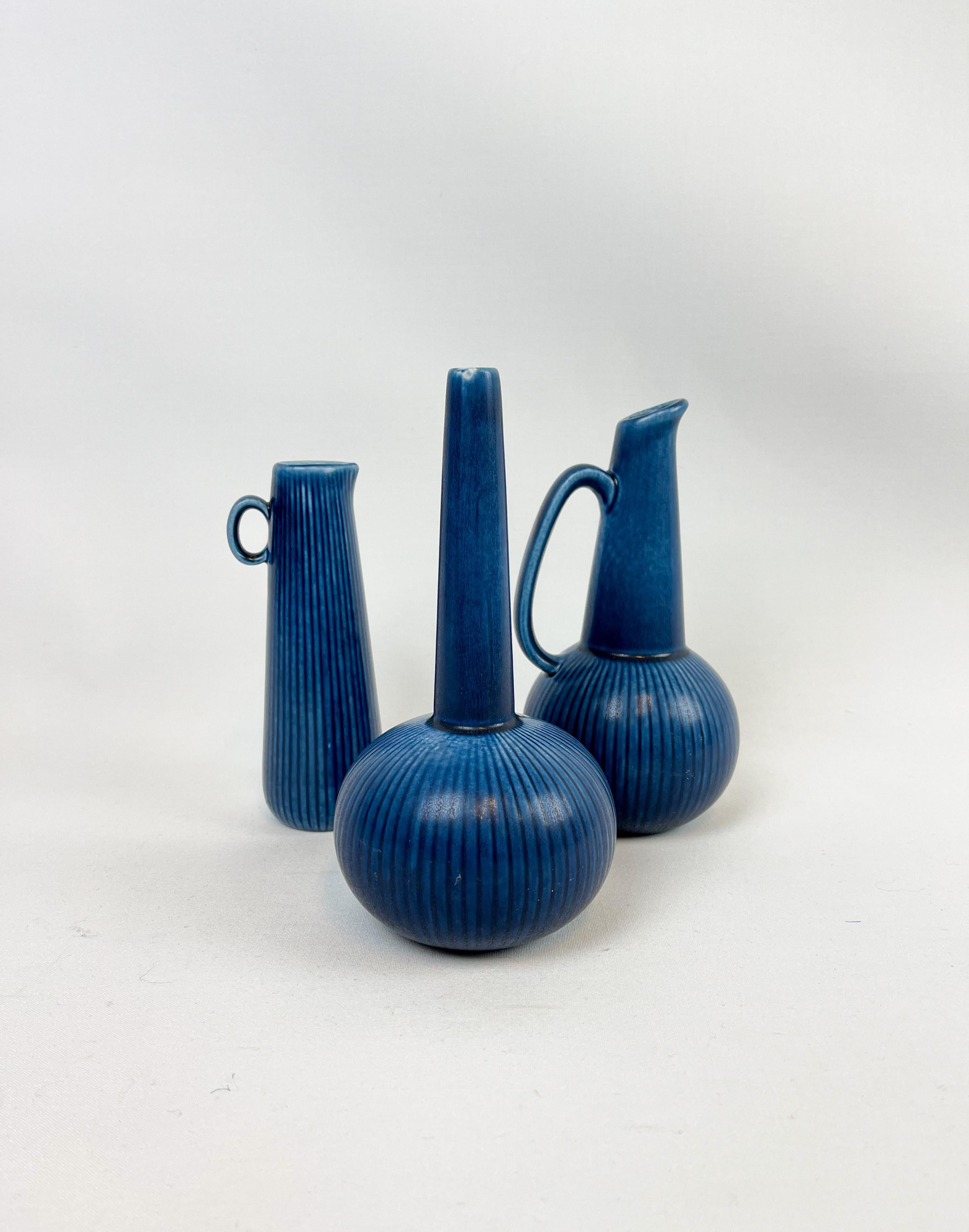 Wonderful blue glaze on these 3 vases from Rörstrand Sweden, designed by Gunnar Nylund in the 1950s.

They are all in good vintage condition. 

Dimensions: H 20, D 10 cm/ H 18 cm, D 6 cm.
   