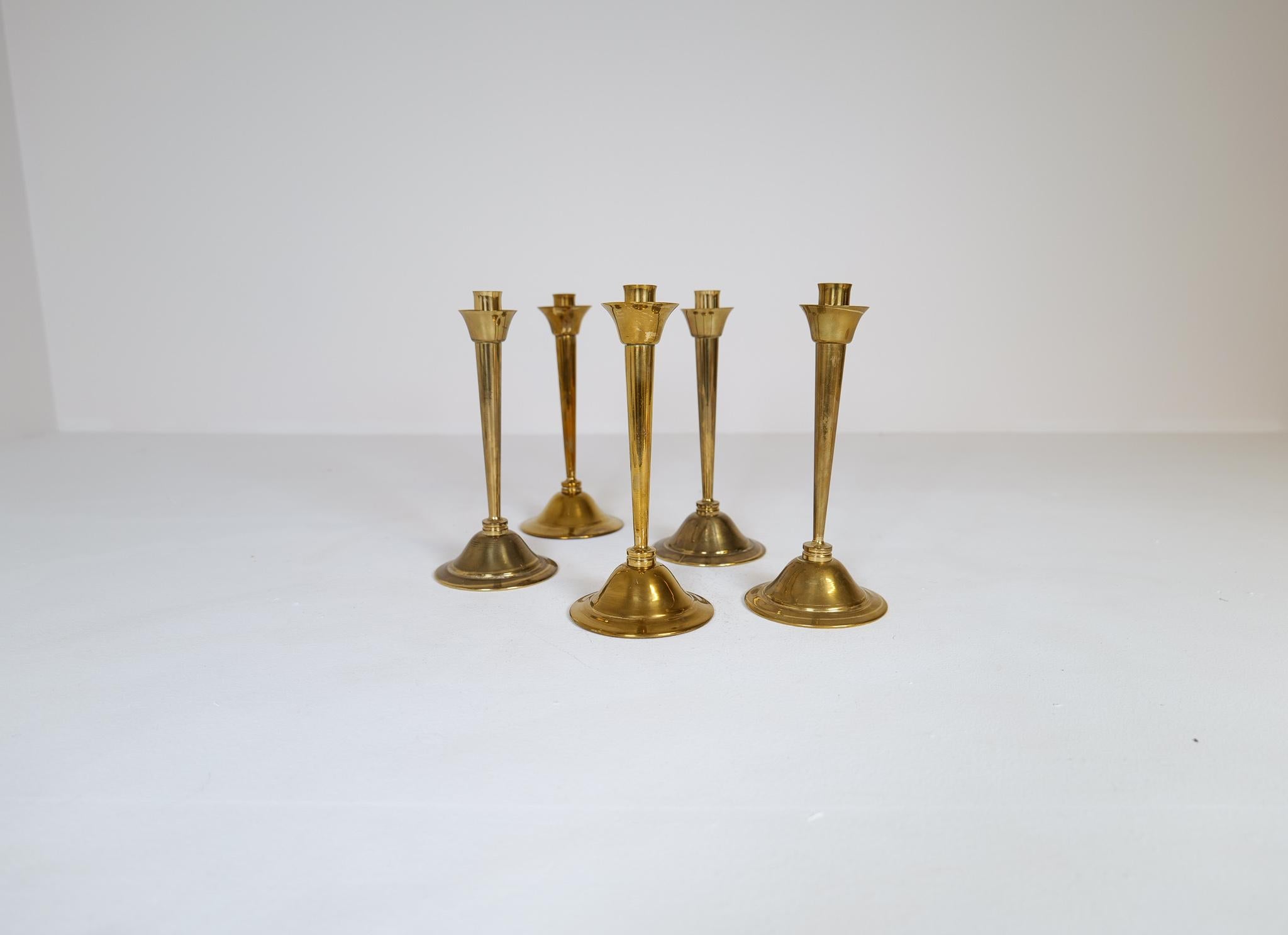 Scandinavian Modern Midcentury Set of 5 Candlesticks in Brass by Lars Holmström Arvika, Sweden For Sale