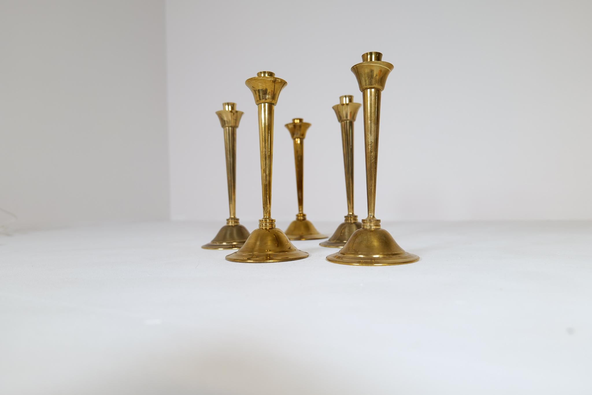 Swedish Midcentury Set of 5 Candlesticks in Brass by Lars Holmström Arvika, Sweden For Sale