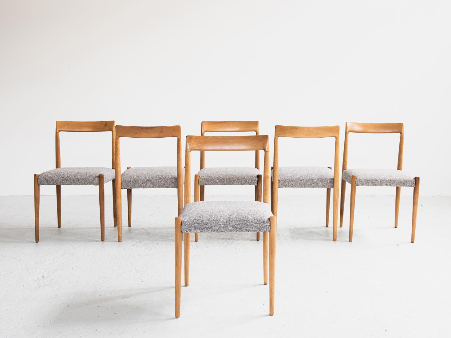 Midcentury set of 6 chairs manufactured by Lübke in Germany in the 1960s. The chairs are made of yellow cherry tree wood . We have reupholstered them in a beautiful grey fabric of good quality. Beautiful veins in the solid wood. Minimalistic design