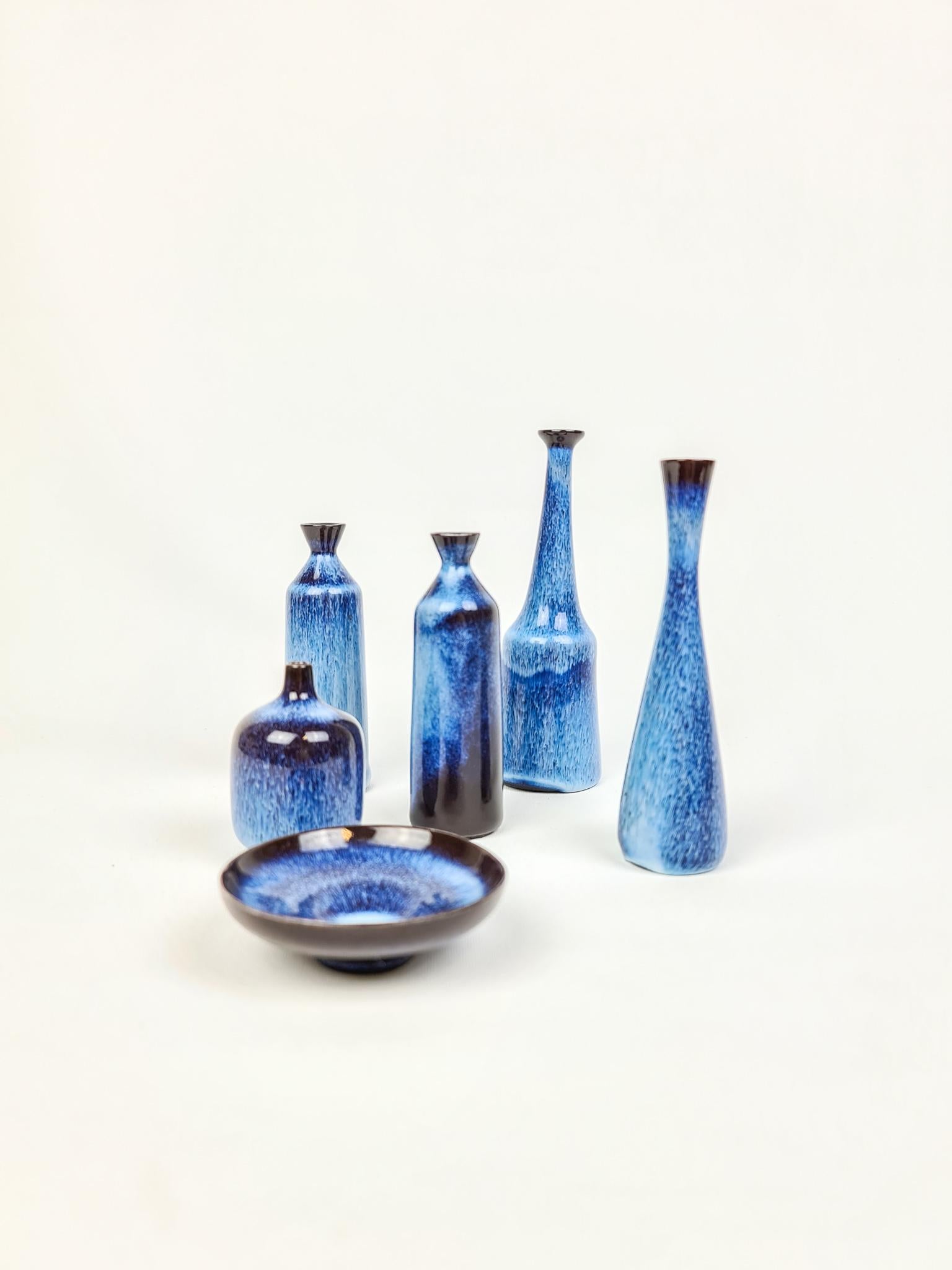 Six wonderful miniature vases from Rörstrand and maker/Designer Gunnar Nylund. Made in Sweden in the midcentury. Beautiful glazed vases in good condition. 

Measures: Height 15 cm to 6 cm in height.